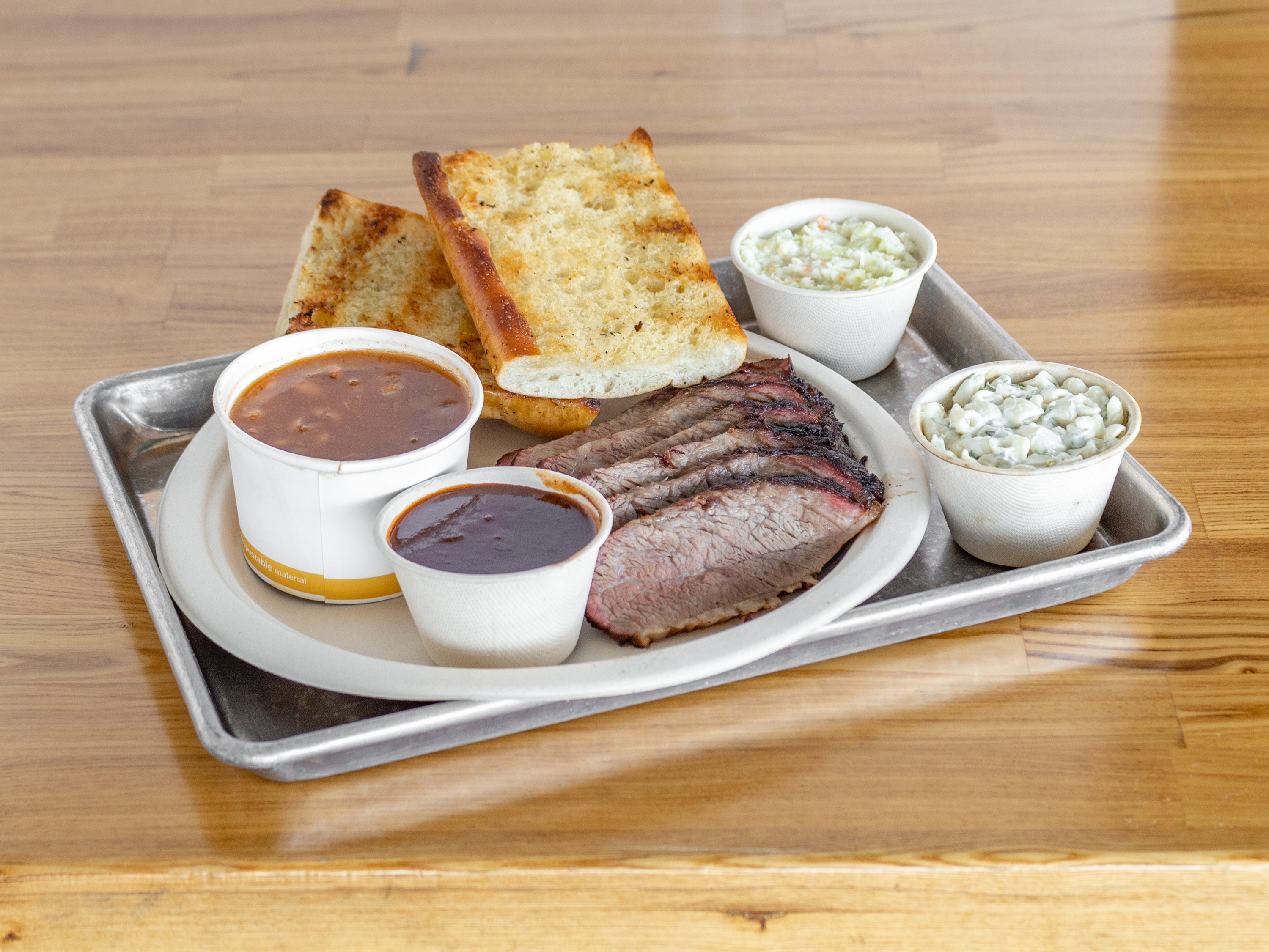 Order 1 lb. Tri Tip food online from Busters Bbq store, Ventura on bringmethat.com