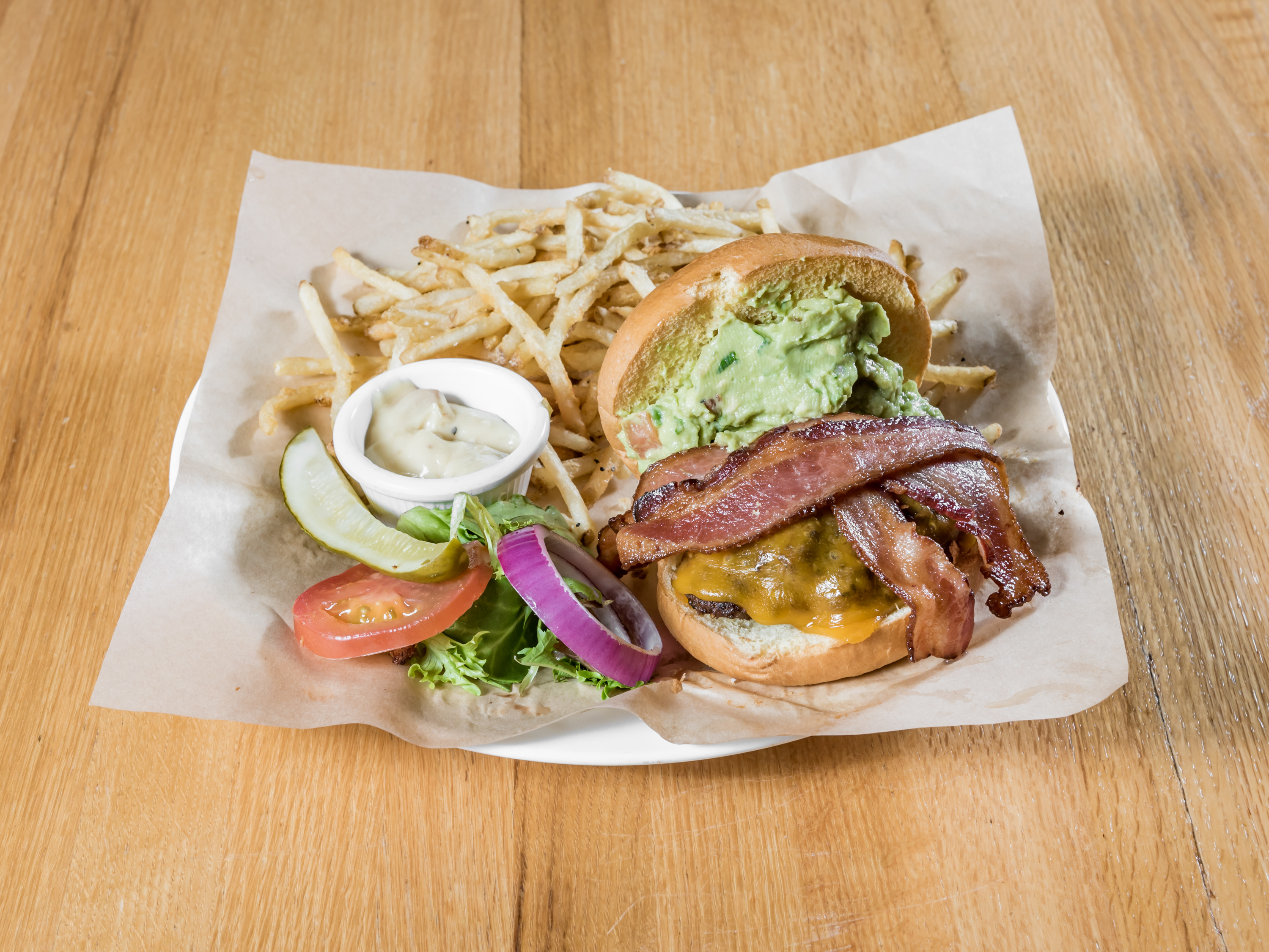 Order The Bacon Guacamole Burger food online from Charley Big Burger store, Albuquerque on bringmethat.com