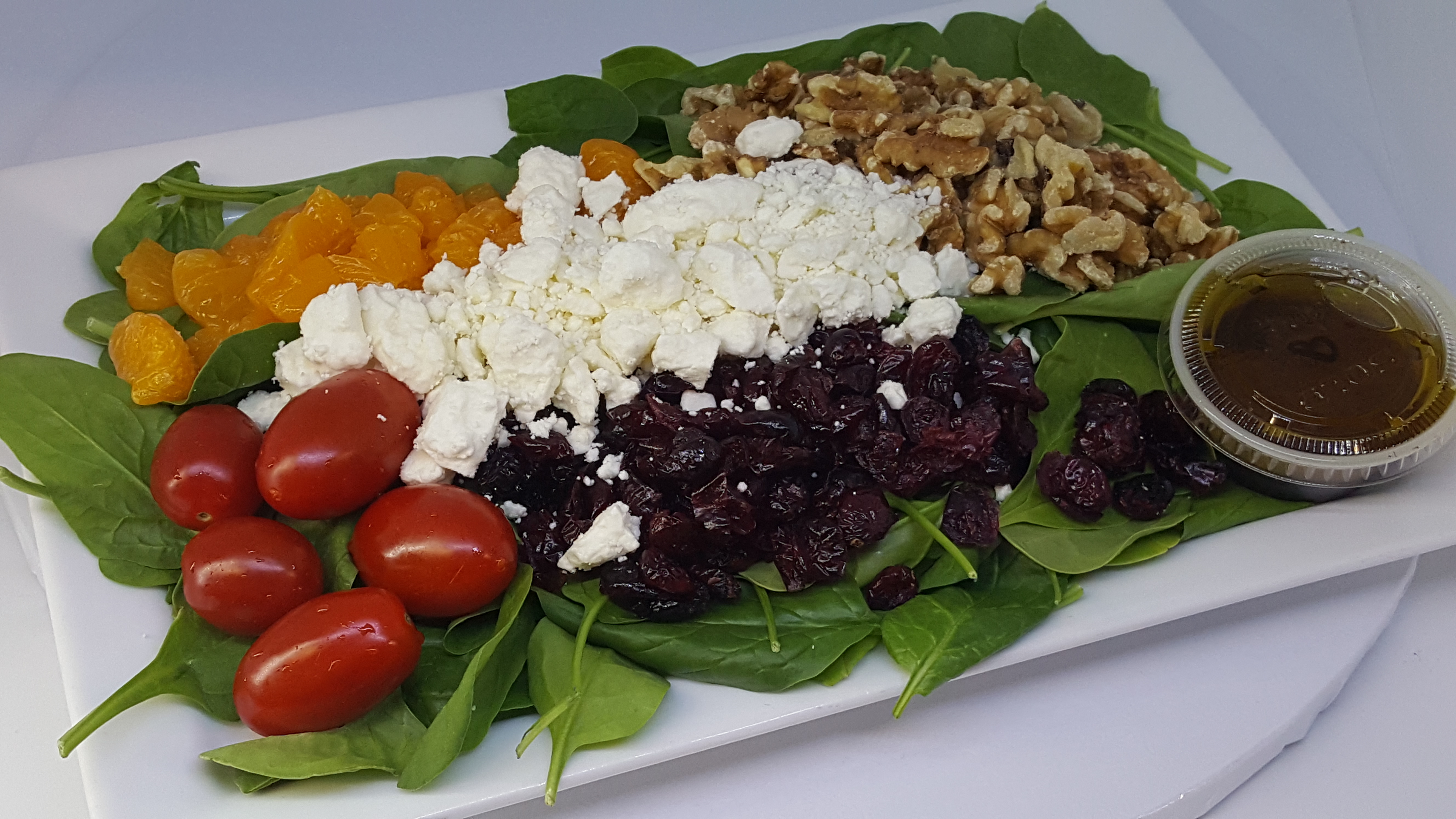 Order Spinach Salad food online from La Bakery store, Carson City on bringmethat.com