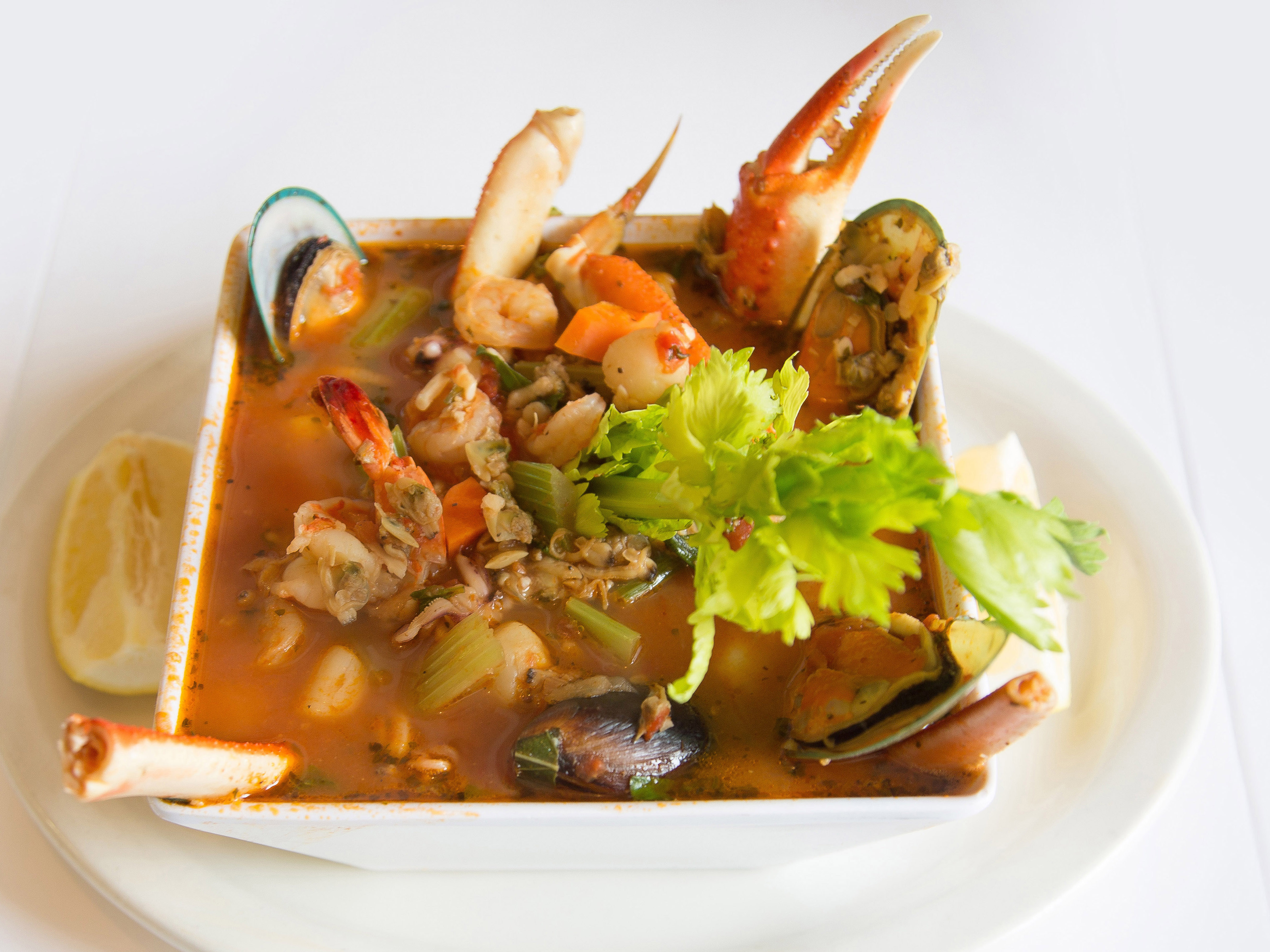 Order Cioppino Dinner food online from Carusos Italian Kitchen store, Los Angeles on bringmethat.com