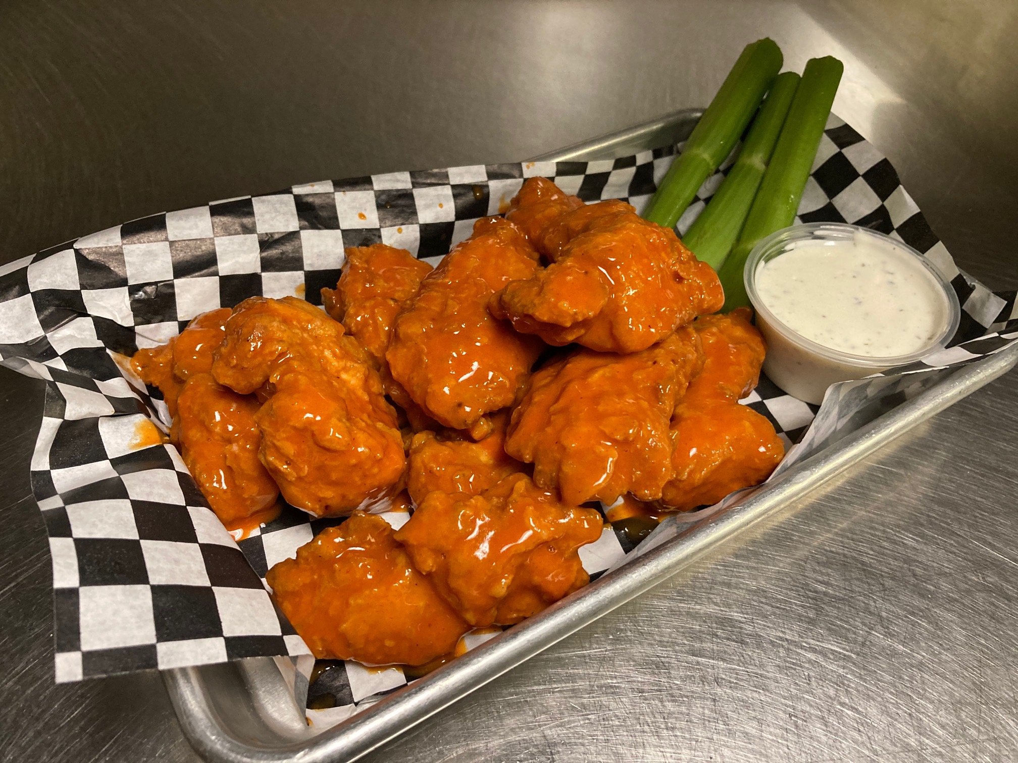 Order Half Pound Boneless Wings food online from Saints Pub + Patio store, Independence on bringmethat.com