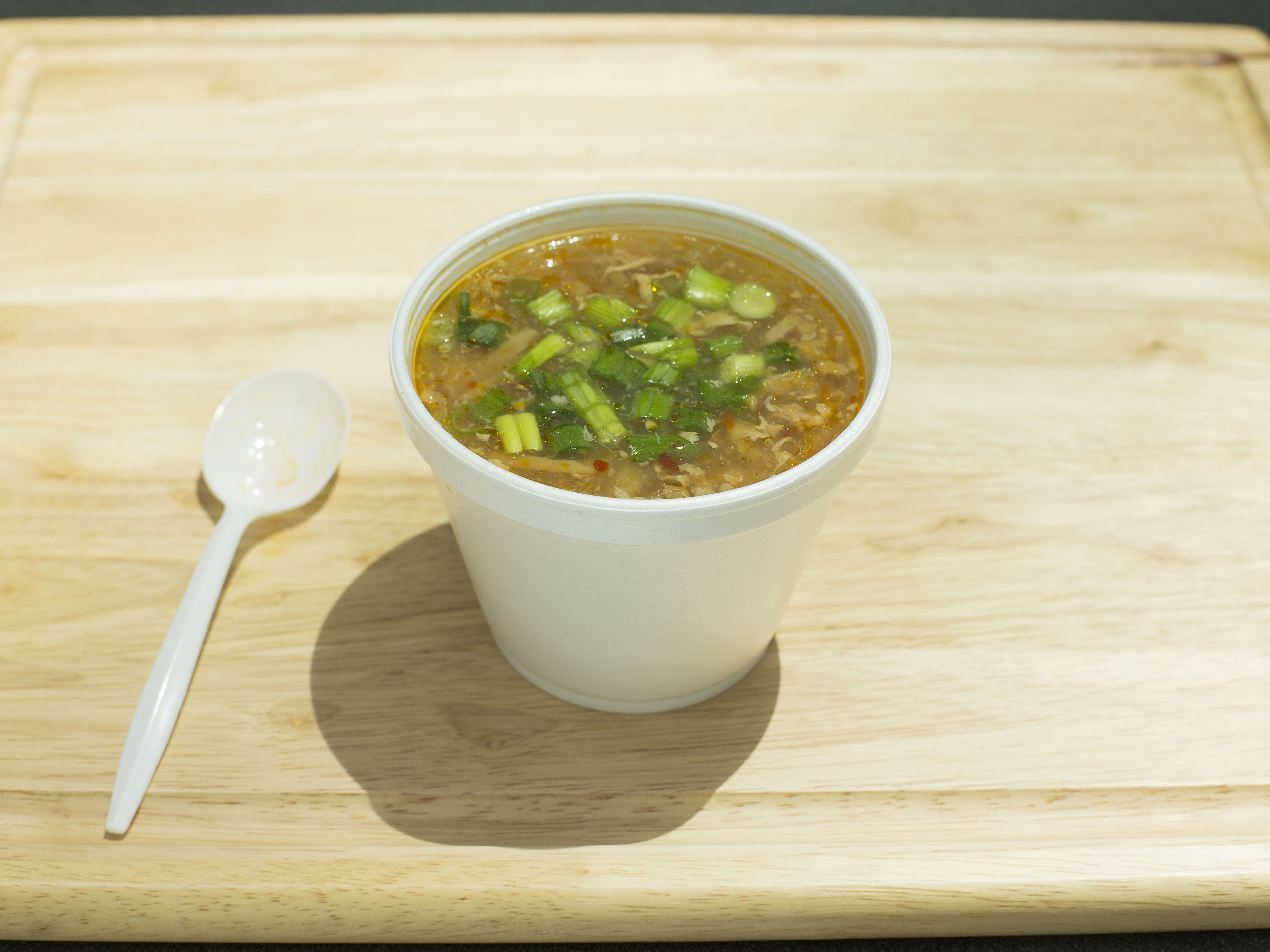 Order Hot and Sour Soup food online from Community Tacos store, Dallas on bringmethat.com