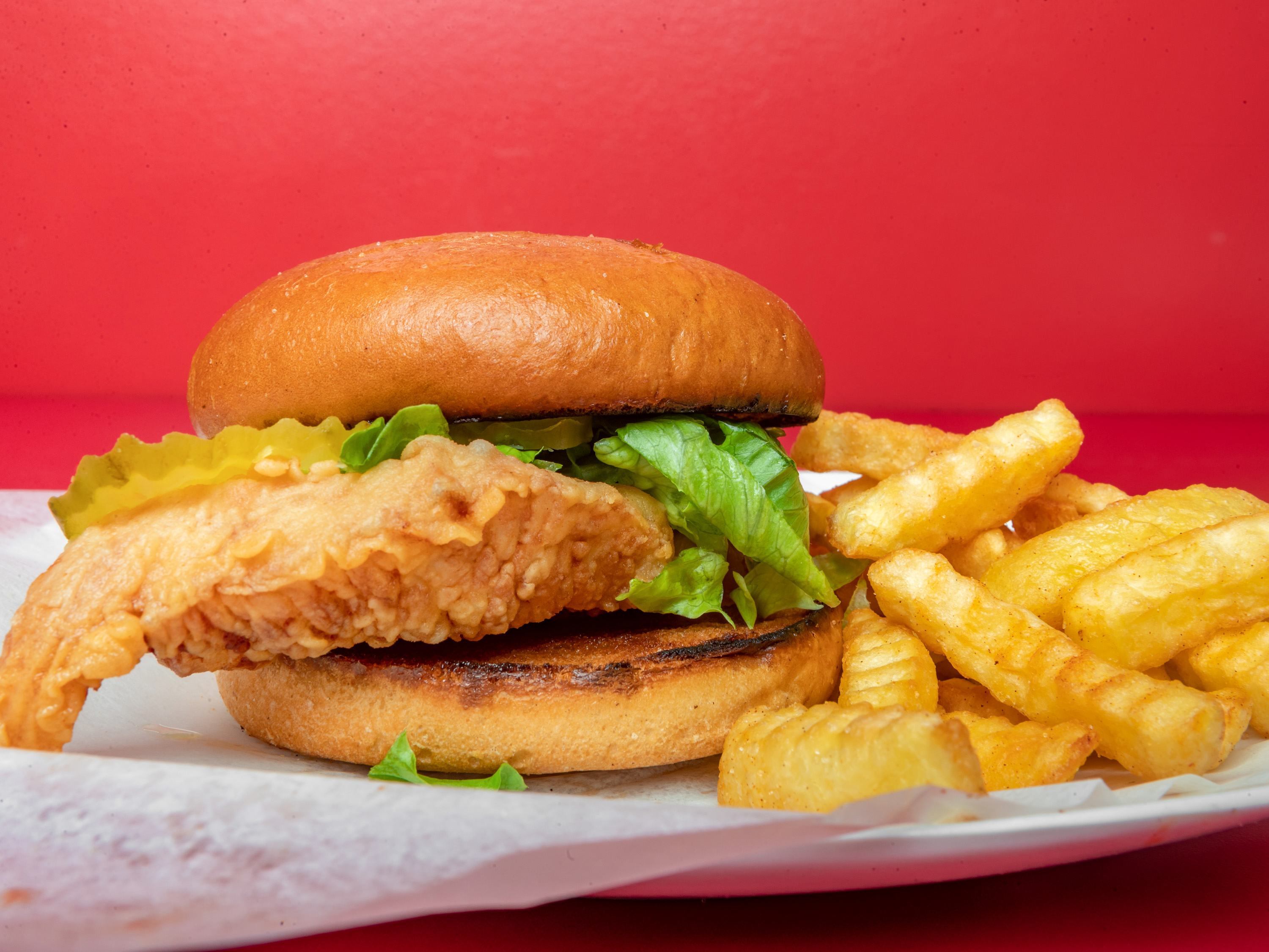 Order Crispy Chiken Sandwich food online from K Wings Cafe store, Lilburn on bringmethat.com