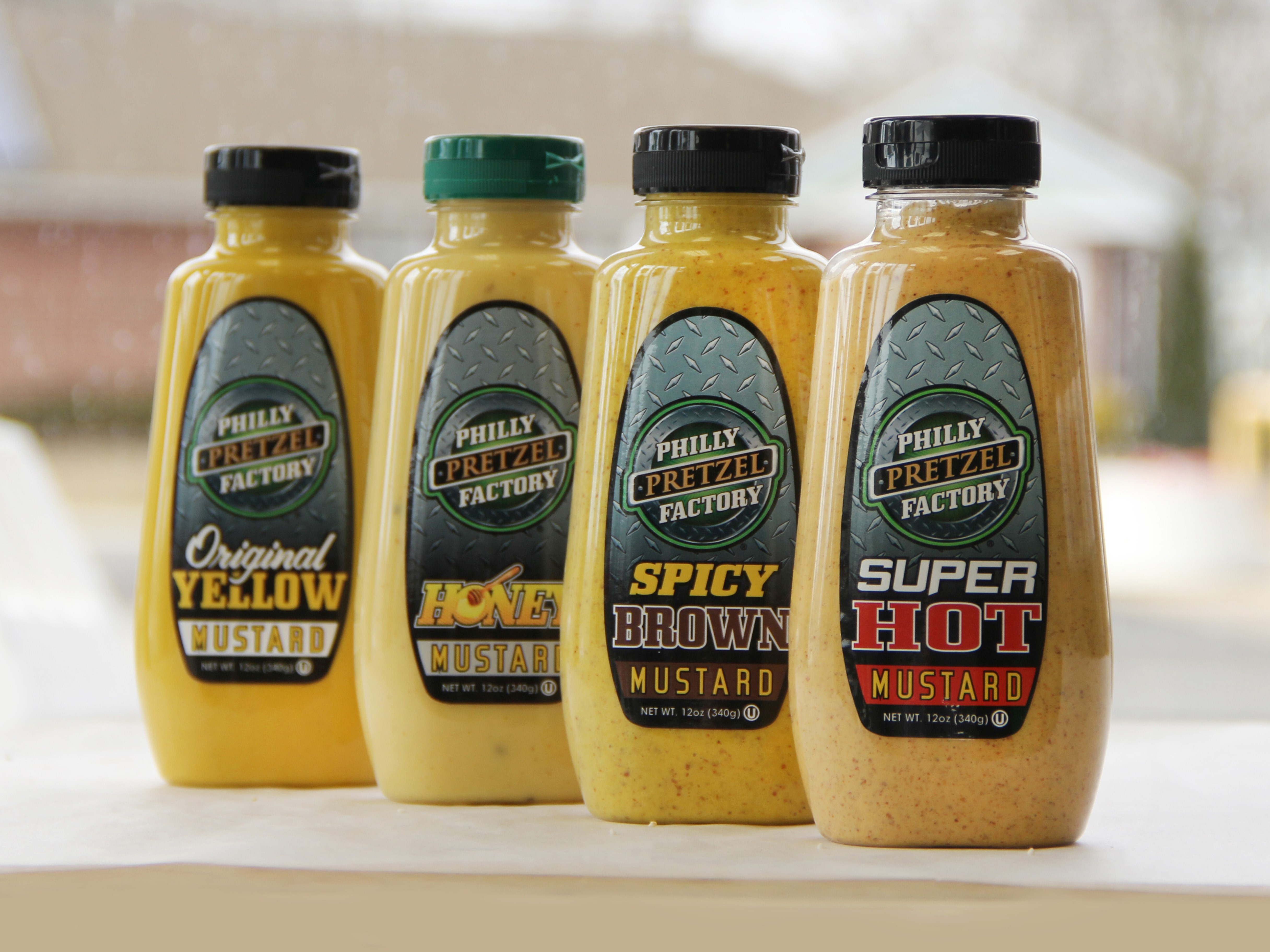Order 12 oz Mustard Bottle food online from Philly Pretzel Factory store, Temple on bringmethat.com