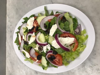 Order Greek Salad food online from Panchos Pizza store, Milford on bringmethat.com
