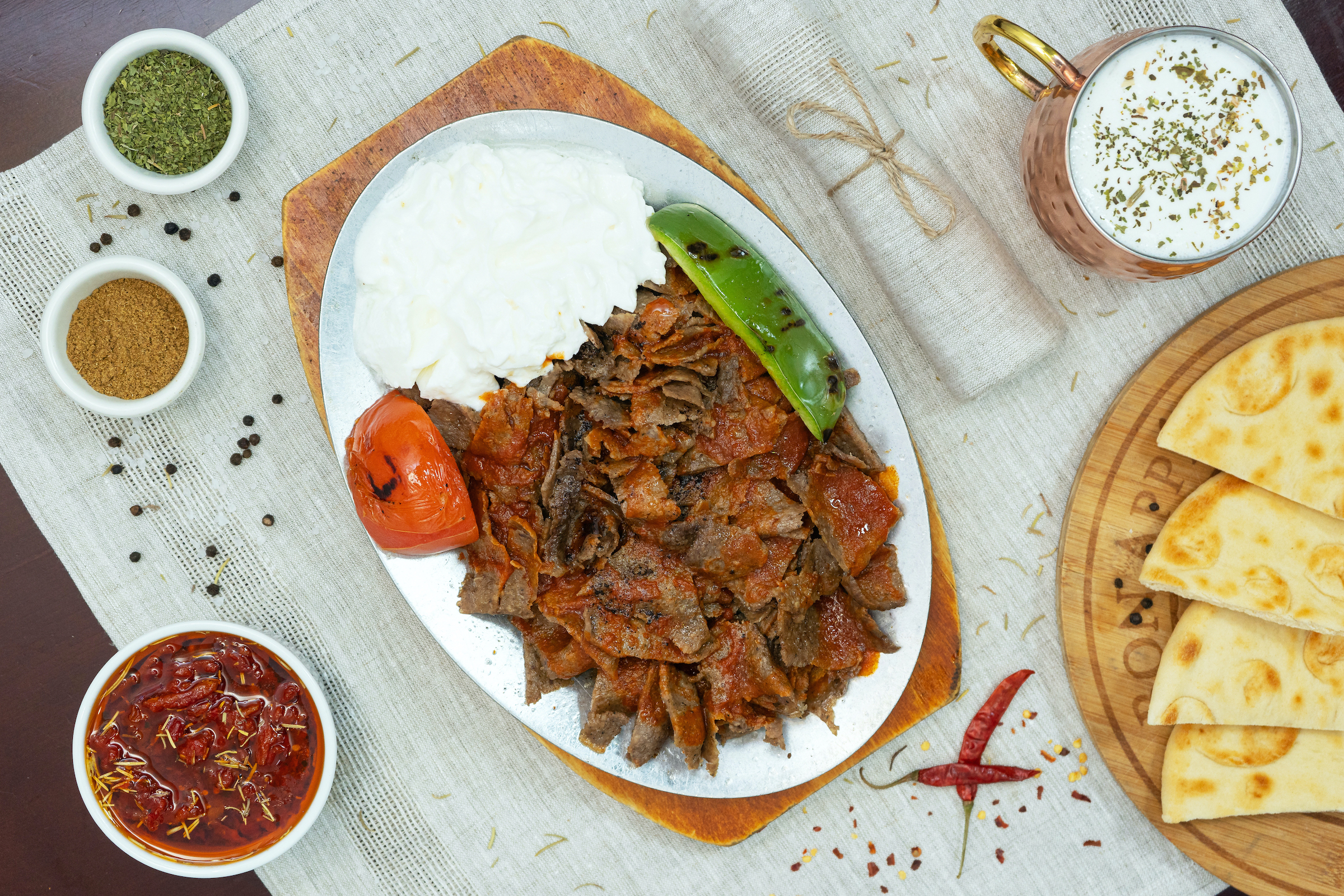 Order Iskender Kebab (Ground) food online from Istanbul Grill California store, Fountain Valley on bringmethat.com