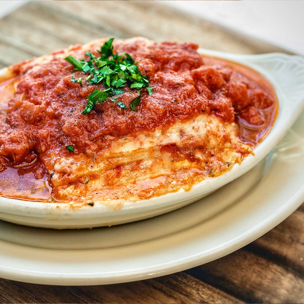 Order Four Cheese Lasagna - Small food online from Amici East Coast Pizzeria store, Vacaville on bringmethat.com