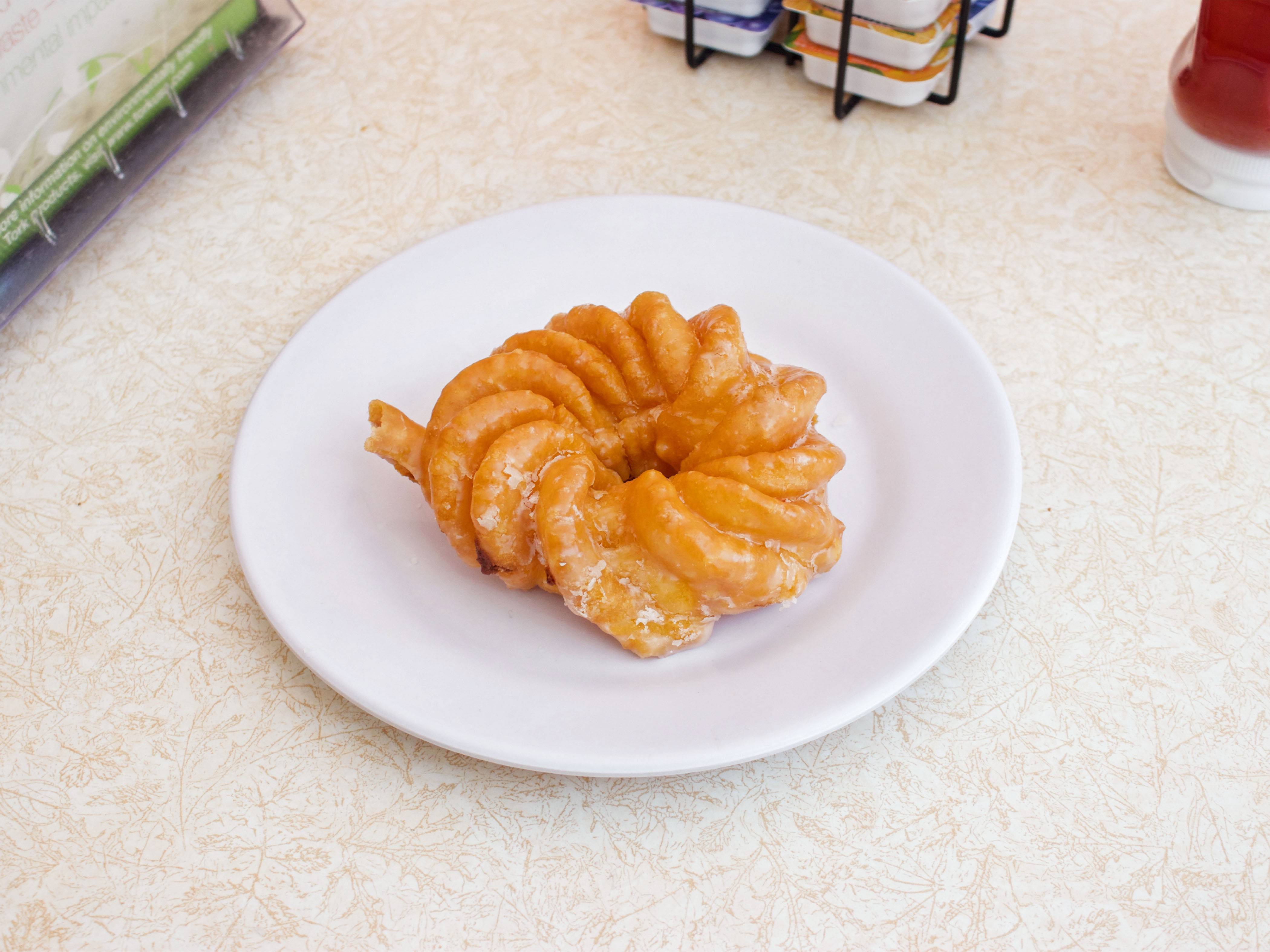 Order French Cruller Donut food online from Chick's Donuts & Coffee Shop store, Concord on bringmethat.com
