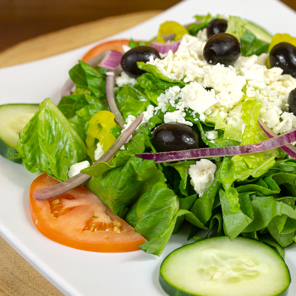 Order Greek Salad food online from Wings Empire store, San Diego on bringmethat.com