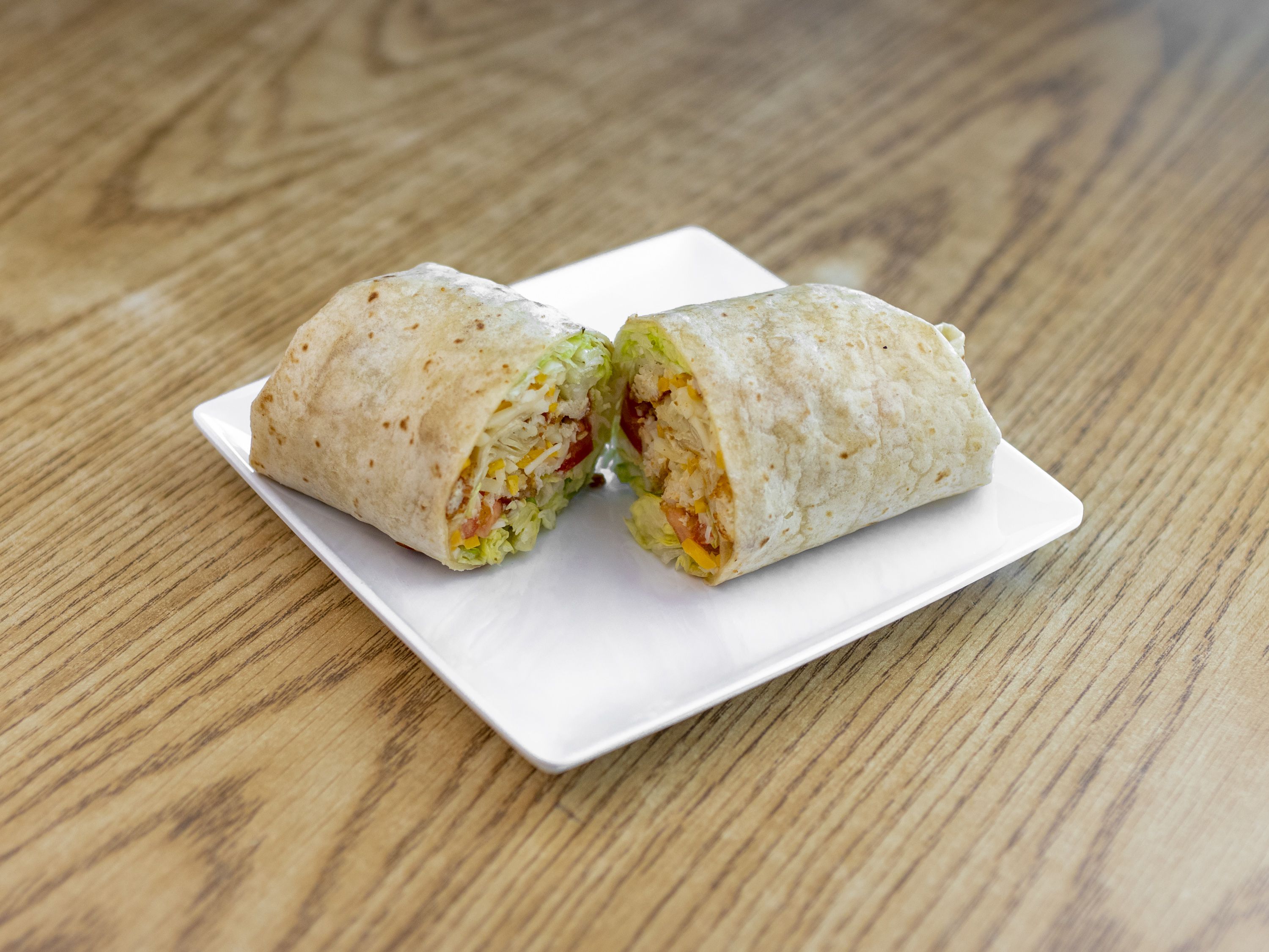 Order Chicken Wrap food online from The Island Bar And Grill store, La Vista on bringmethat.com