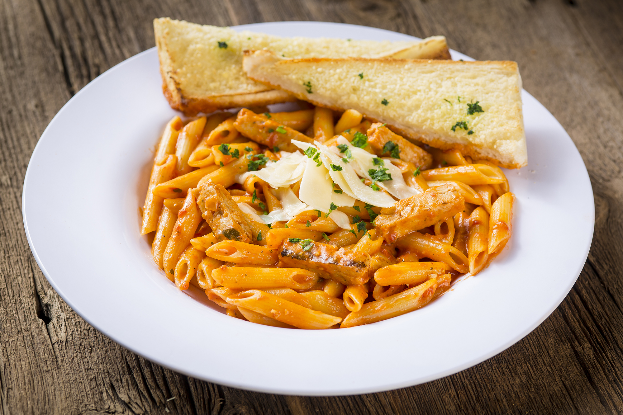 Order Penne and Grilled Chicken a la Vodka food online from Rosati's Pizza store, Chicago on bringmethat.com