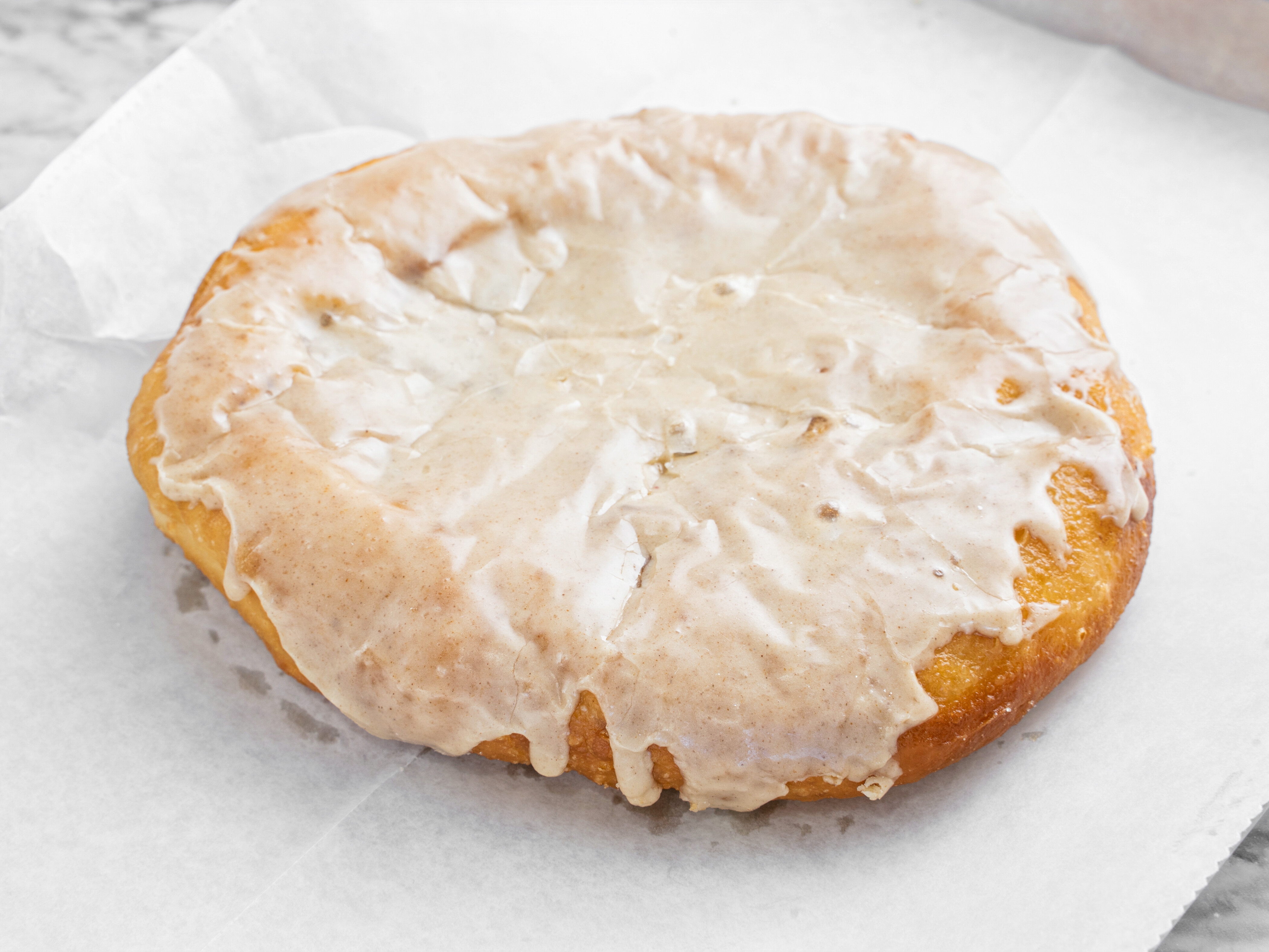 Order Giant Apple Fritter food online from Sugar Donuts store, Charlotte on bringmethat.com