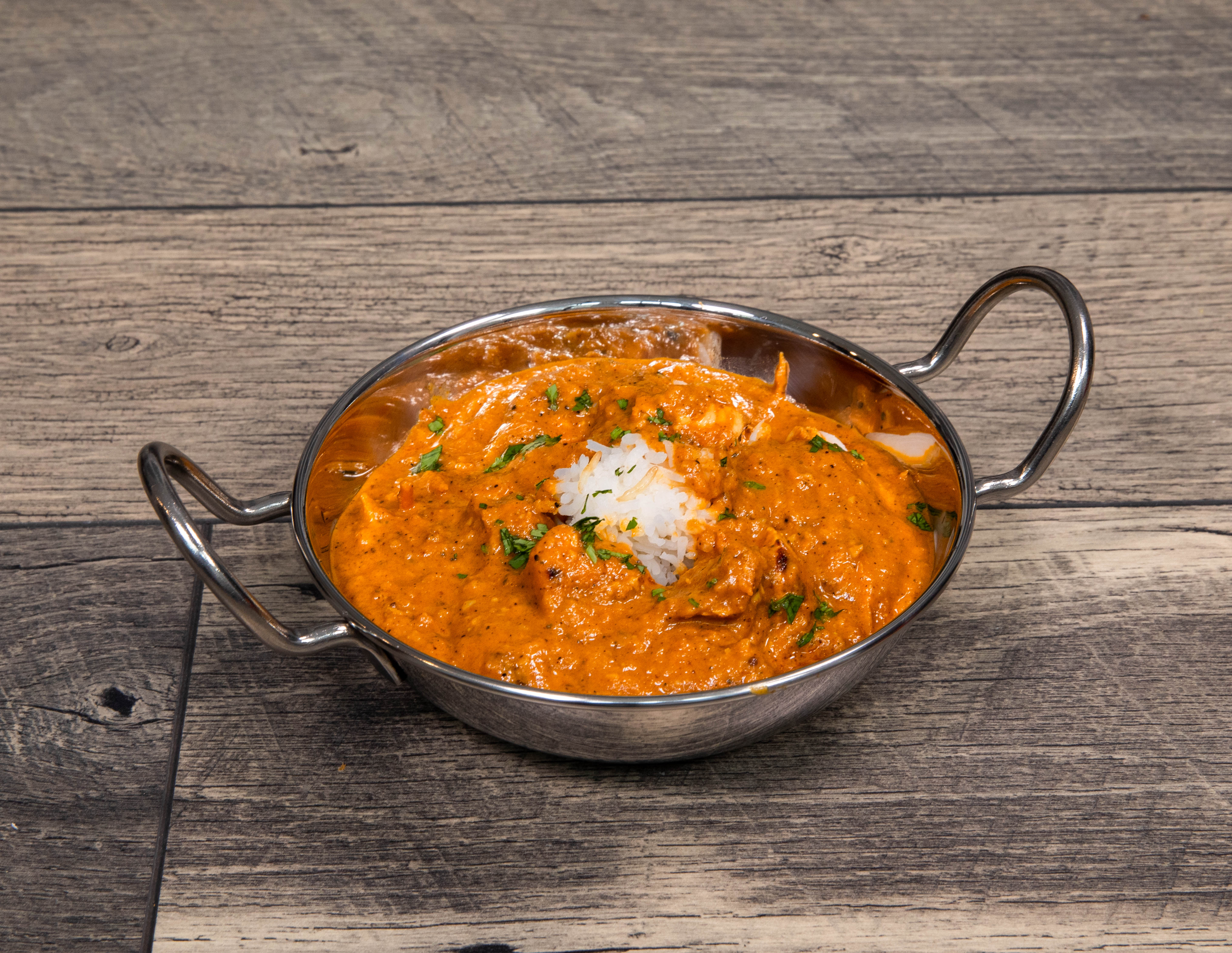 Order Butter Chicken food online from Stone Hearth Indian Cafe store, Waco on bringmethat.com