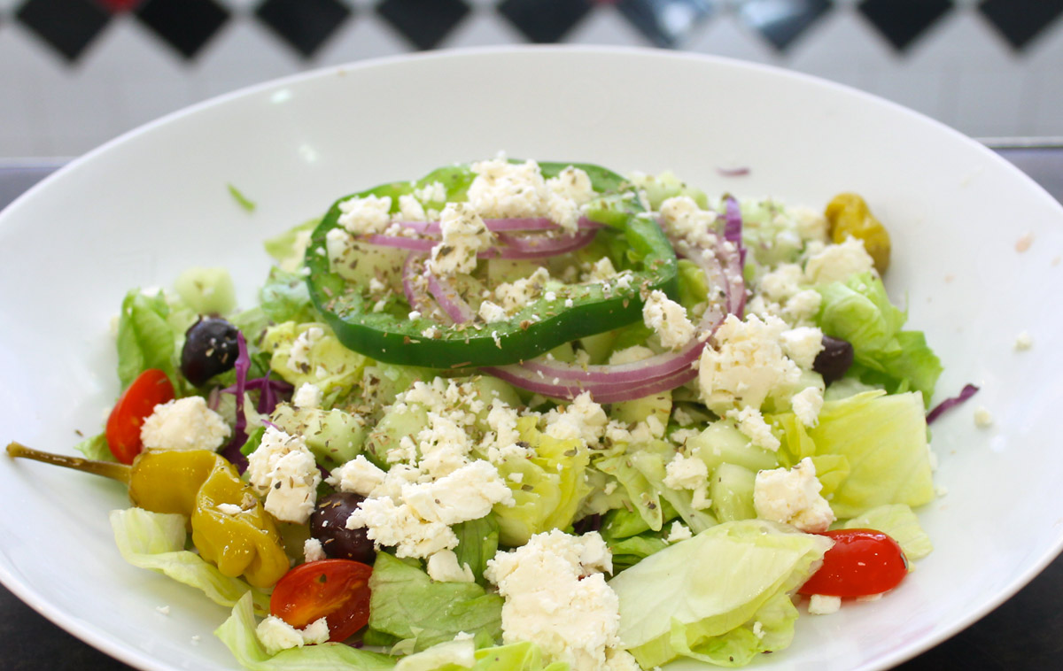 Order Greek Salad food online from White Palace Grill store, Chicago on bringmethat.com
