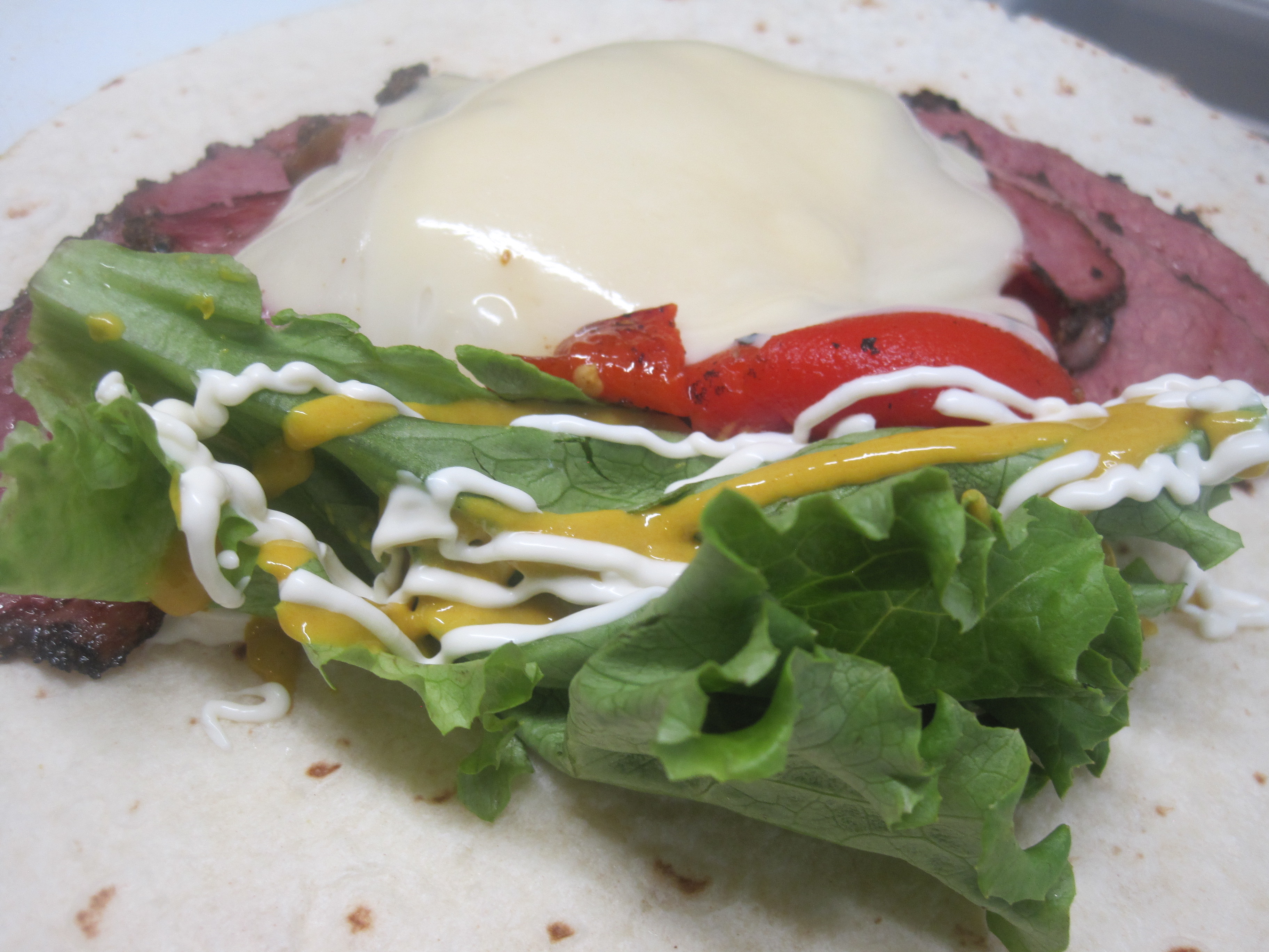 Order Pastrami Wrap food online from La Bakery store, Carson City on bringmethat.com