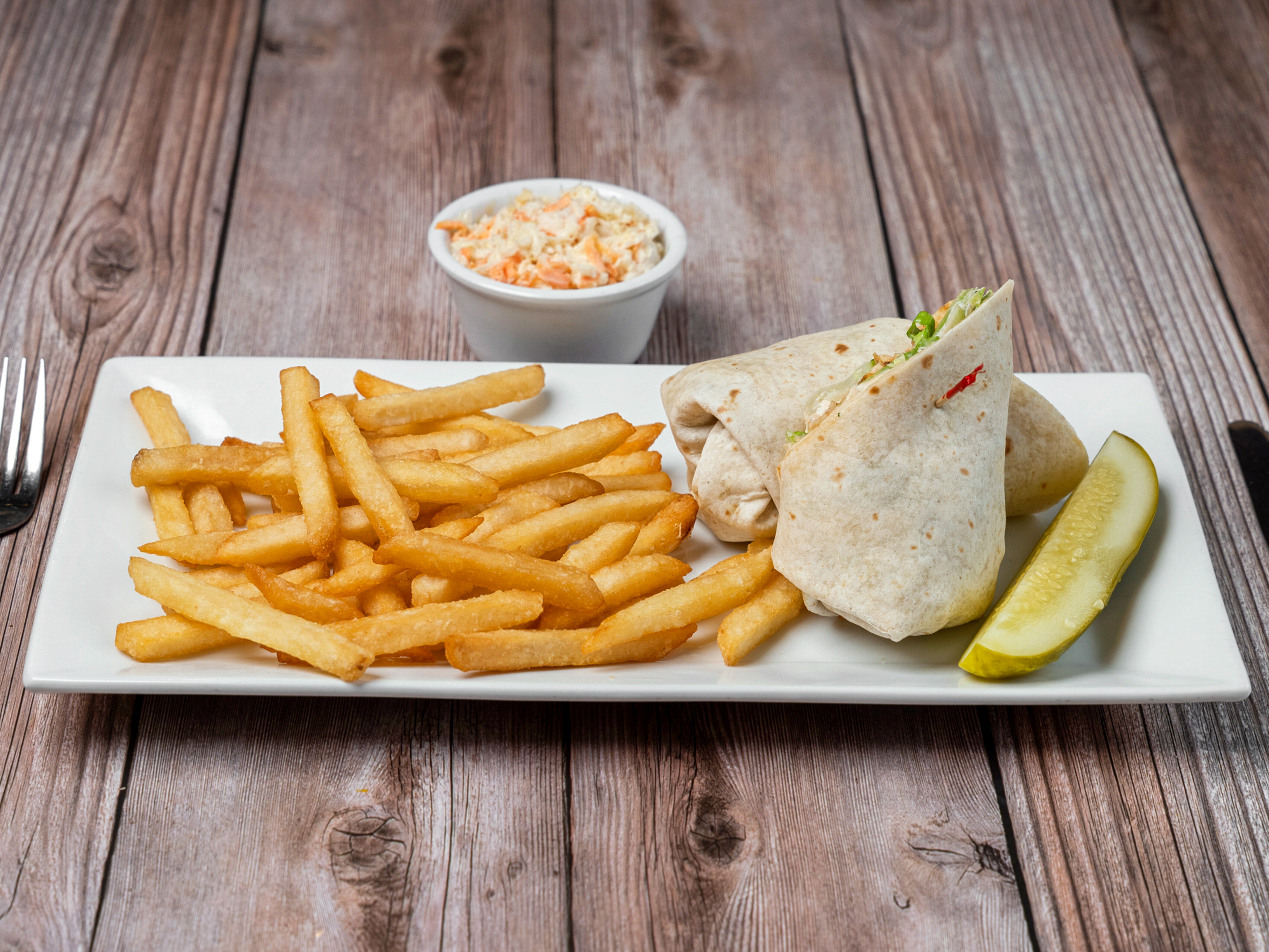 Order Grilled Chicken Caesar Wrap food online from Rudy Bar And Grill store, Bethlehem on bringmethat.com