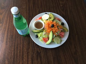 Order Garden Salad (Large) food online from Latino Deli Restaurant store, Bridgeport on bringmethat.com