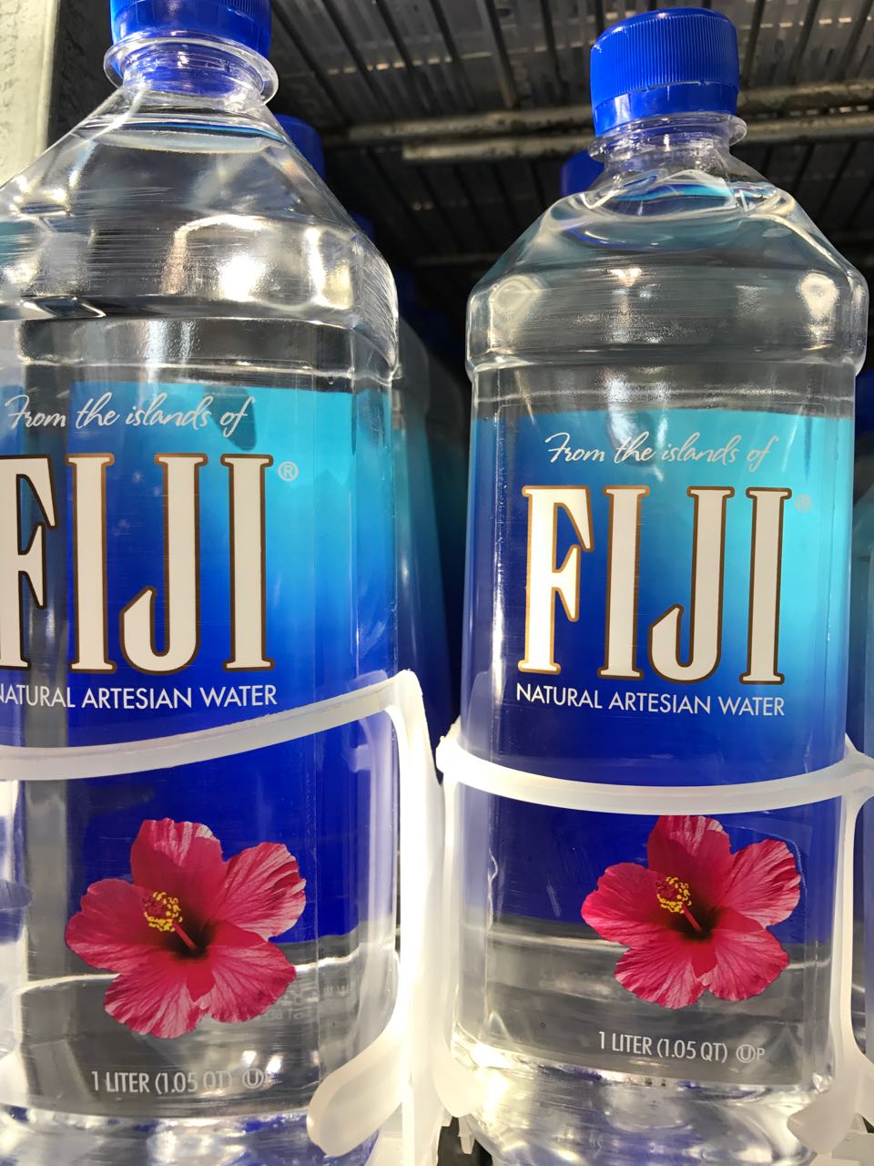 Order one Liter of Fiji Water food online from The Ice Cream Shop store, Providence on bringmethat.com