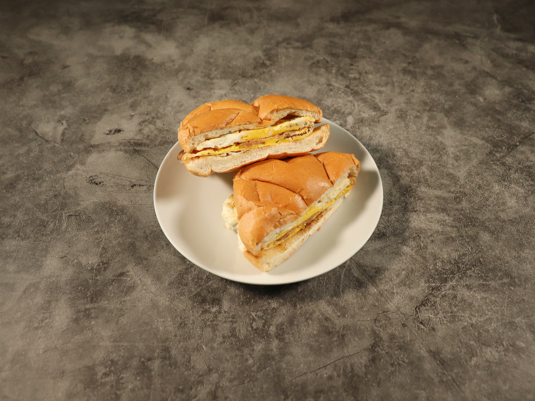 Order 2 Eggs and Bacon Sandwich food online from Mike Bagel Deli Cafe And Pizza store, Roselle Park on bringmethat.com