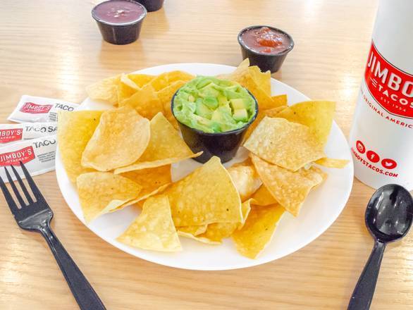 Order Guac (4 oz) & Chips food online from Jimboy'S Tacos store, Shingle Springs on bringmethat.com