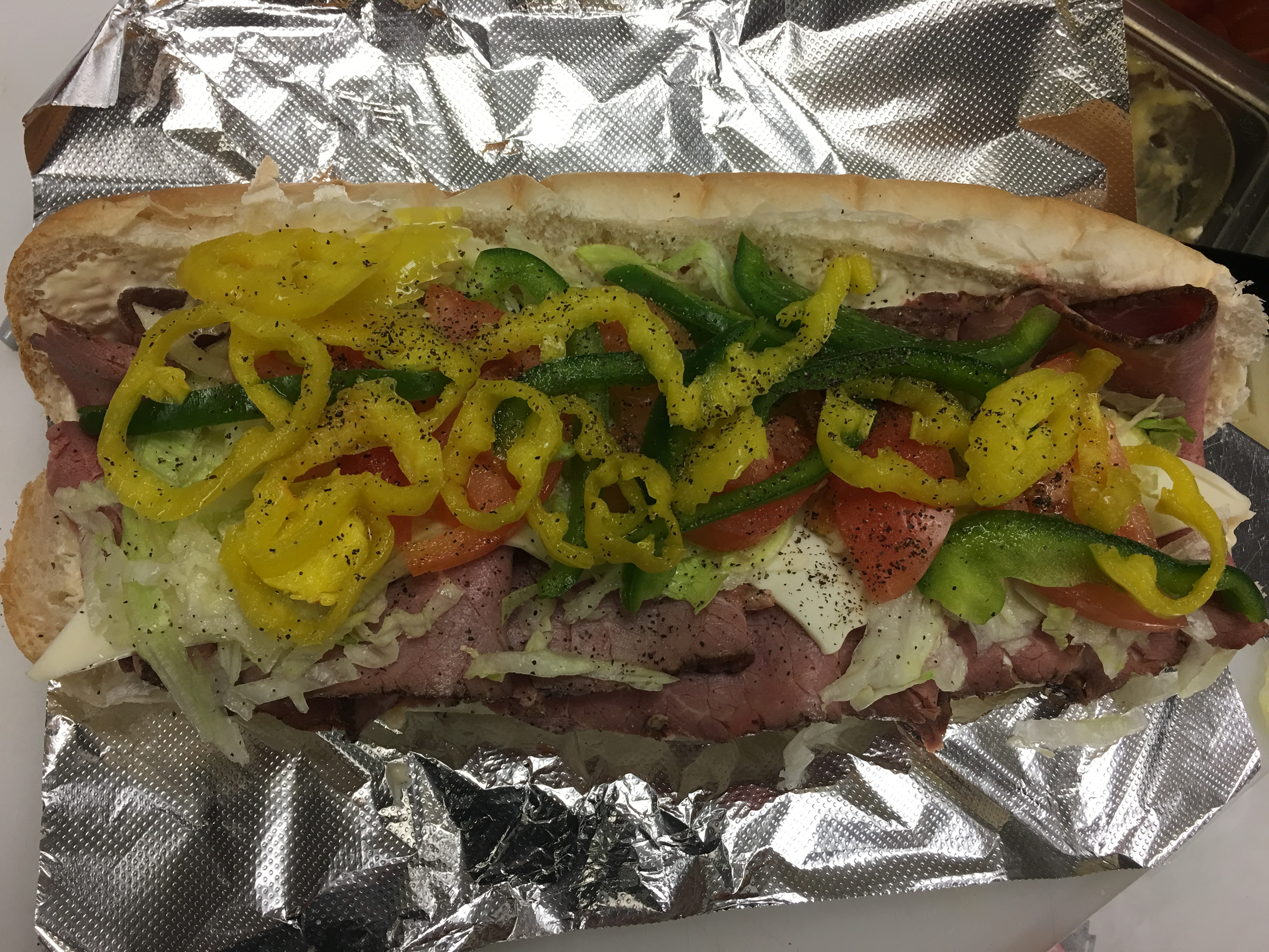 Order Roast Beef Grinder food online from Family Style Pizza store, Framingham on bringmethat.com