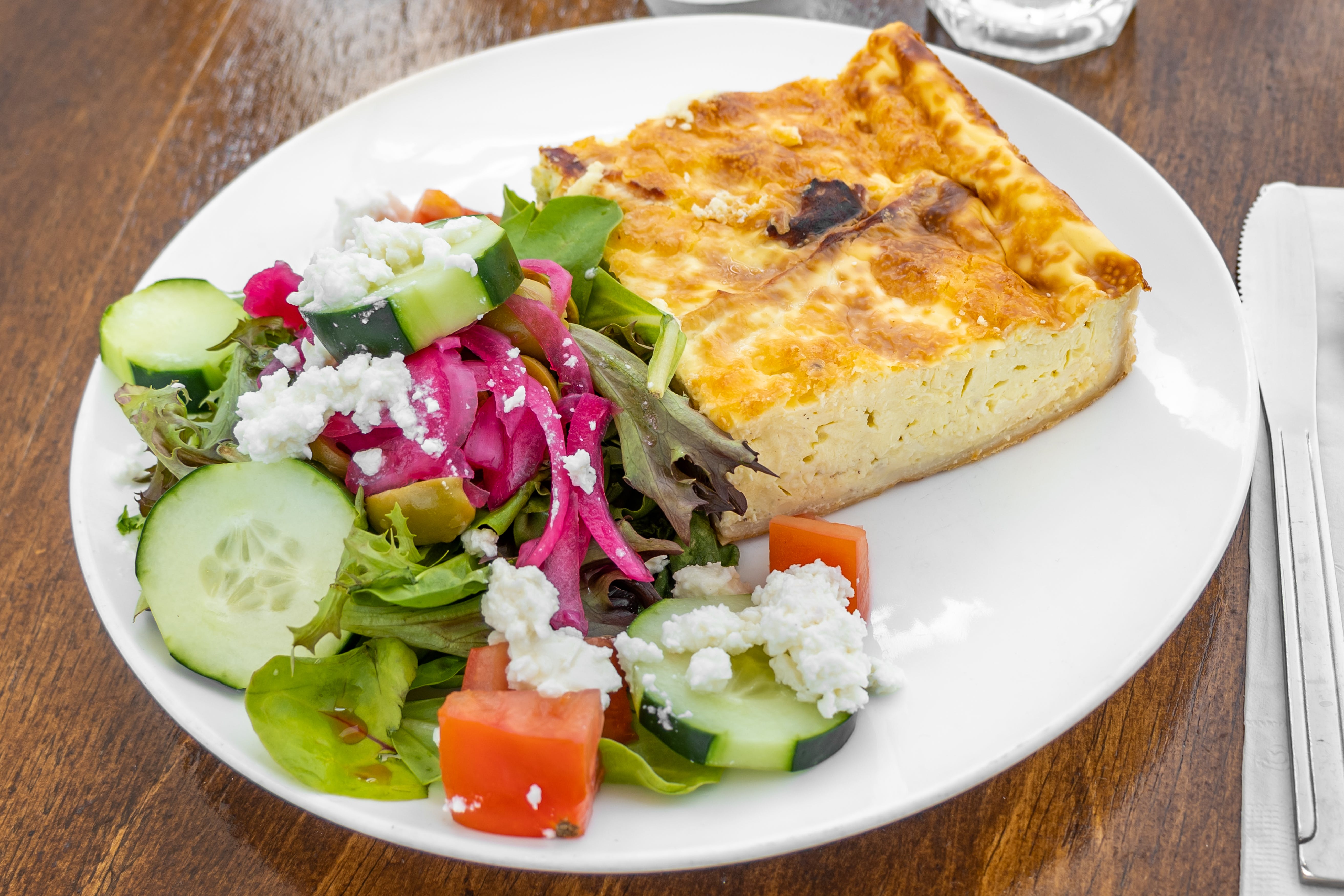 Order Quiche Lorraine - Entree food online from Creme Brulee Bistro & Cafe store, Philadelphia on bringmethat.com