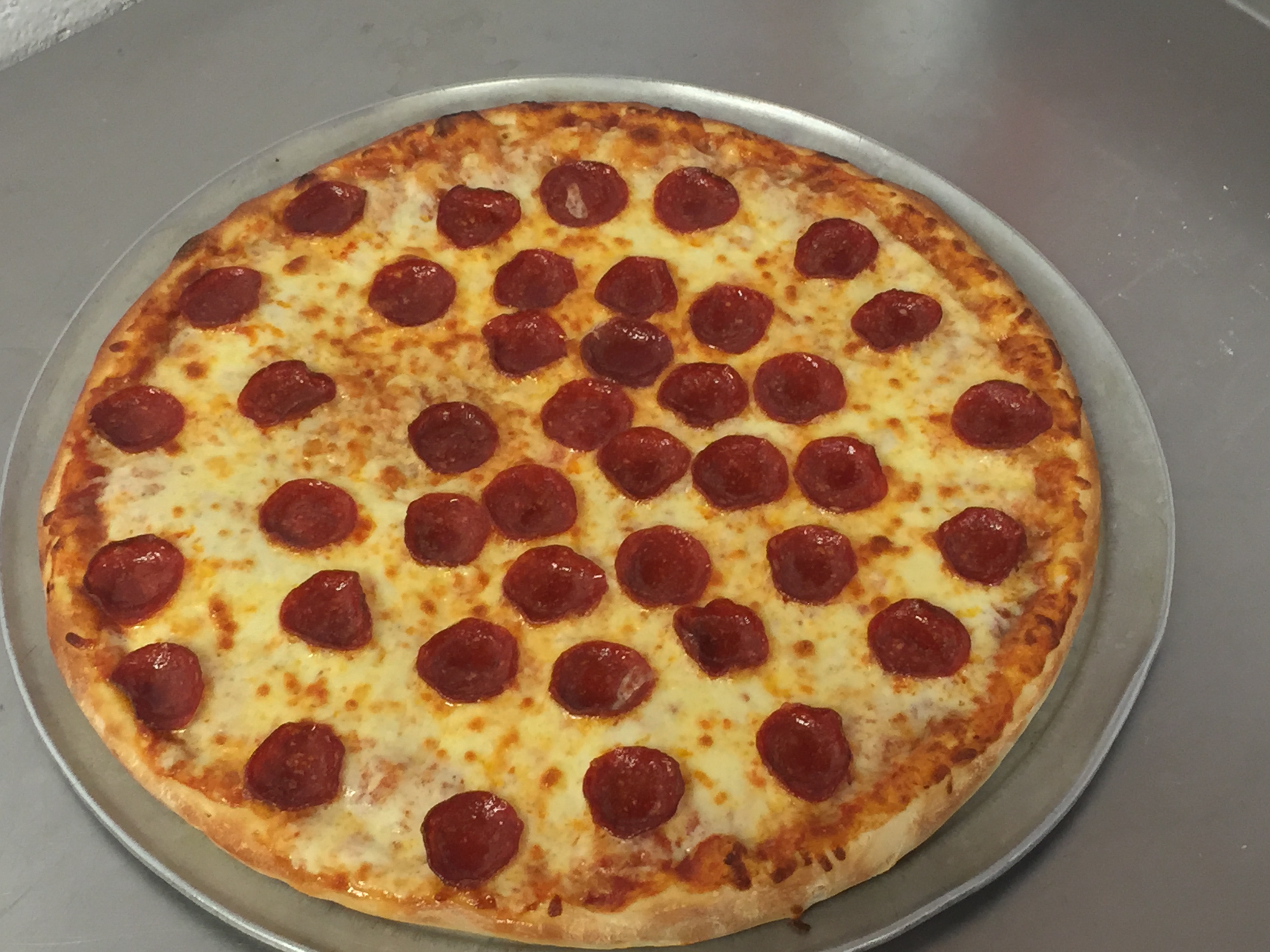 Order Large Pizza & 36 Wings Special food online from Eagle Pizzeria store, Rochester on bringmethat.com
