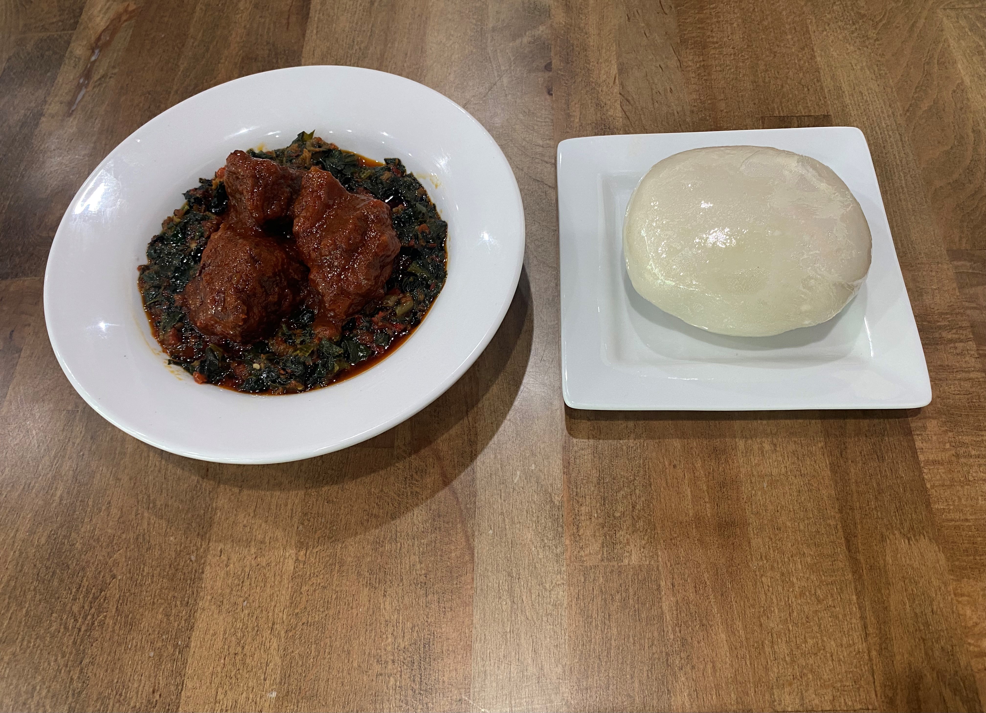 Order Poundo-Fufu + Efo Riro-Spinach + Beef food online from Fusion Vibes Kitchen + Bar store, Richardson on bringmethat.com