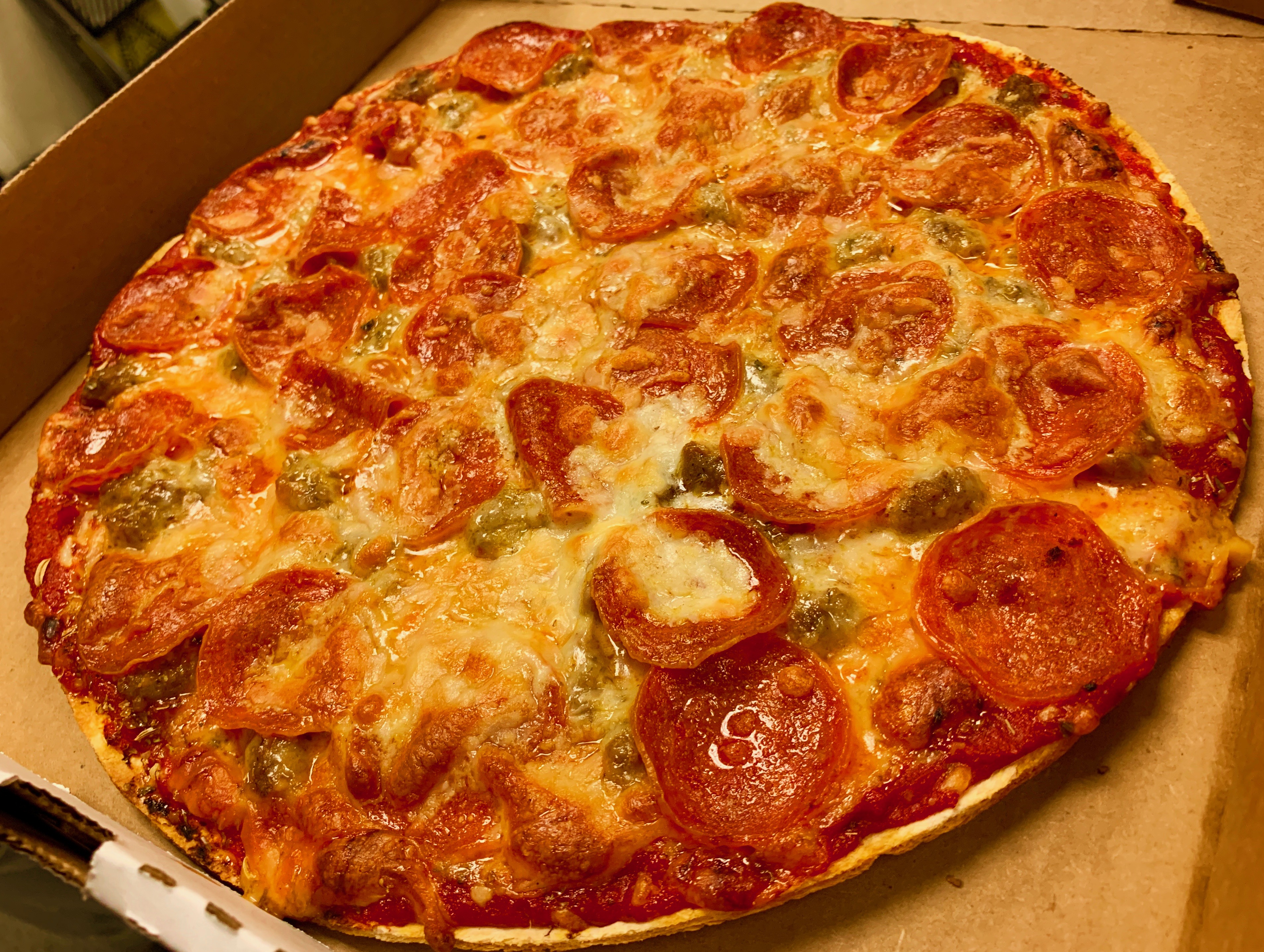 Order 12" St. Louis Style Thin Crust Cheese Pizza food online from The Over/Under Bar & Grill store, Saint Louis on bringmethat.com