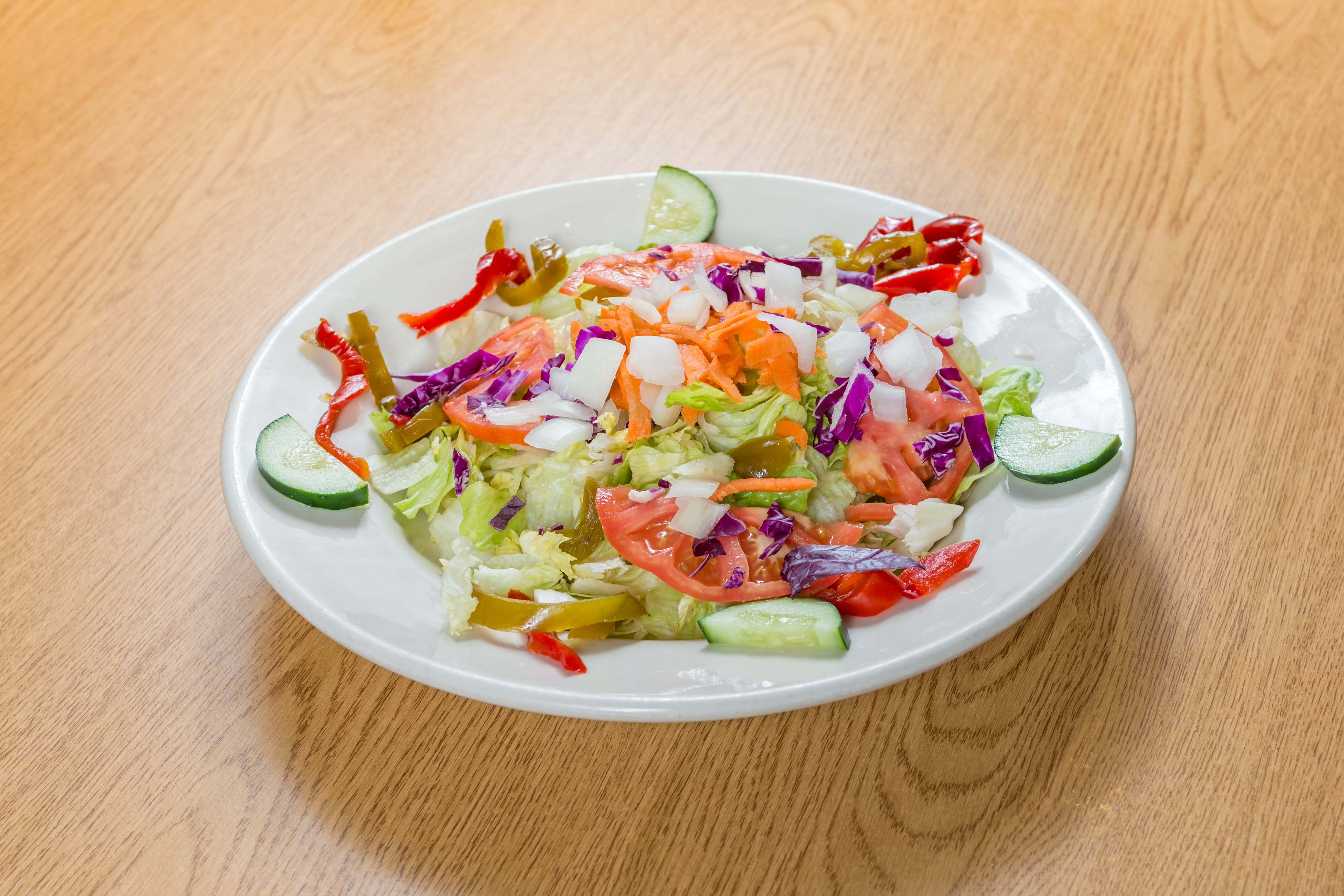 Order Tossed Salad - Small food online from Andre's Pizza store, Oxford on bringmethat.com