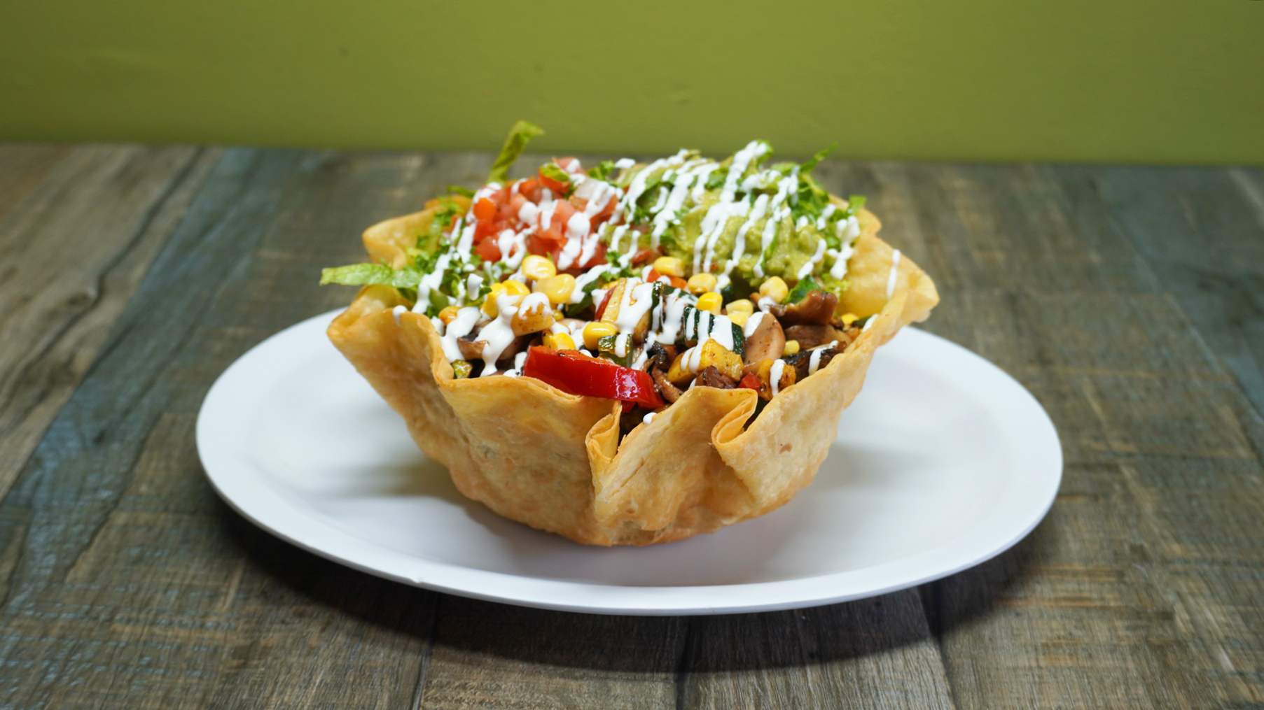 Order Grilled Veggie Tostada food online from Benny Munchies store, Culver City on bringmethat.com