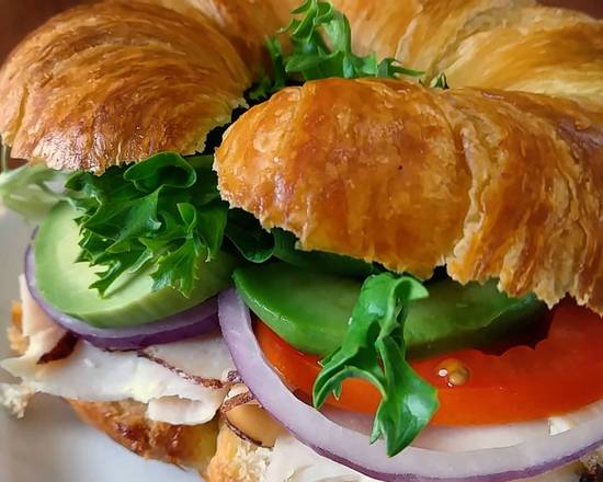 Order Turkey Avocado Croissant food online from Chocolate Cafe store, Columbus on bringmethat.com