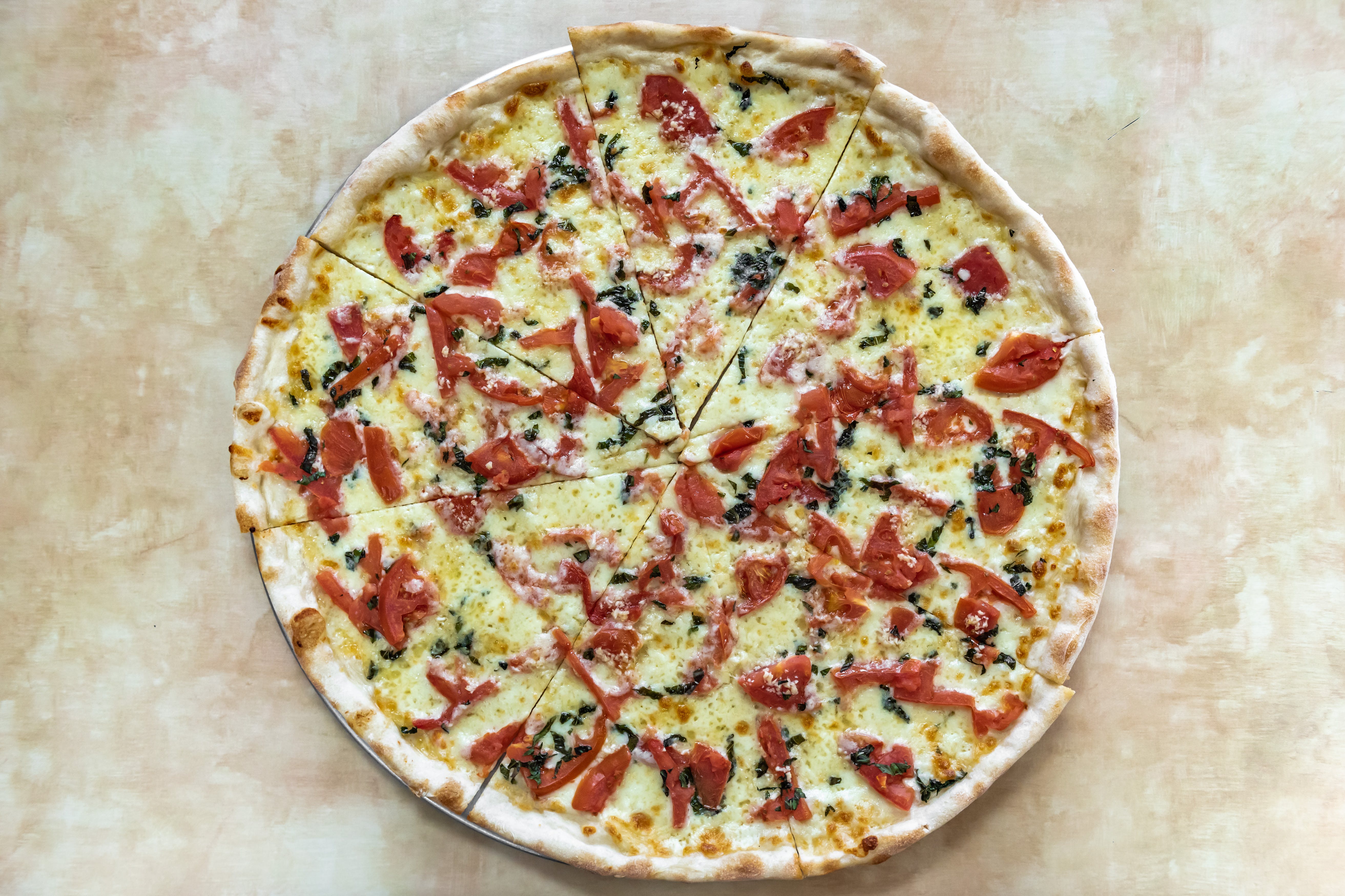 Order Fresh Garlic, Tomatoes & Basil Pizza - Regular (8 Slices) food online from Bambino's Pizza & Pasta store, Danbury on bringmethat.com