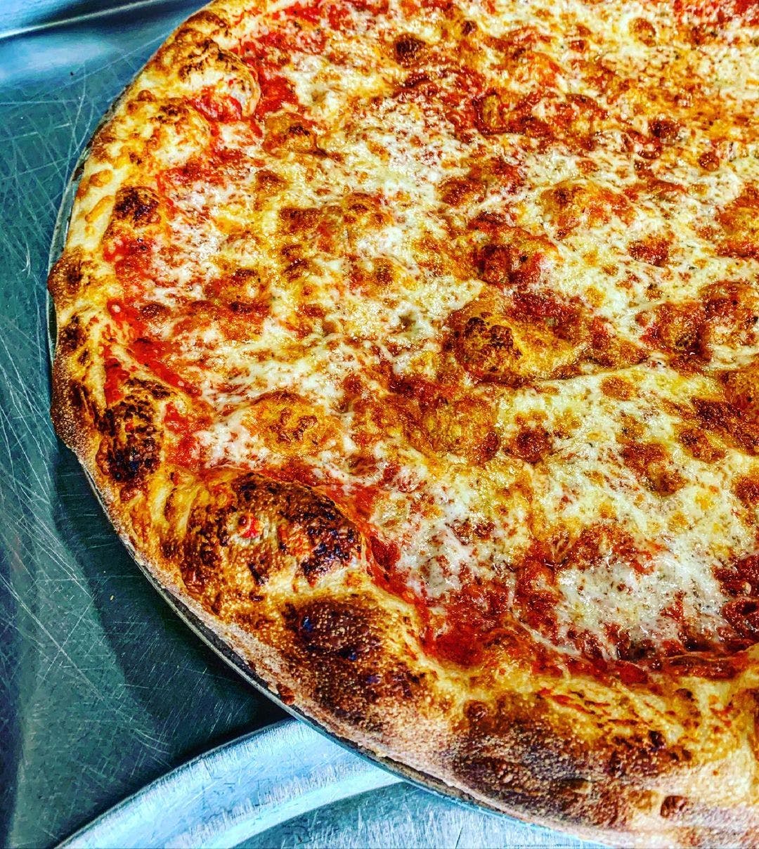 Order Round Classic Cheese Pie - 18" (8 Slices) food online from Slicebox Pizza store, Seattle on bringmethat.com