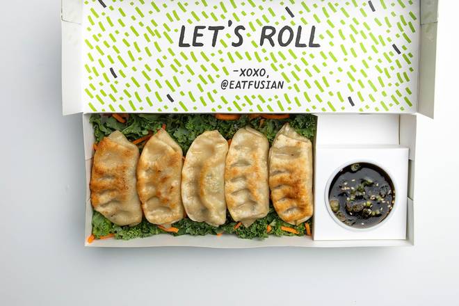 Order chicken gyoza (potstickers) food online from Fusian store, Columbus on bringmethat.com