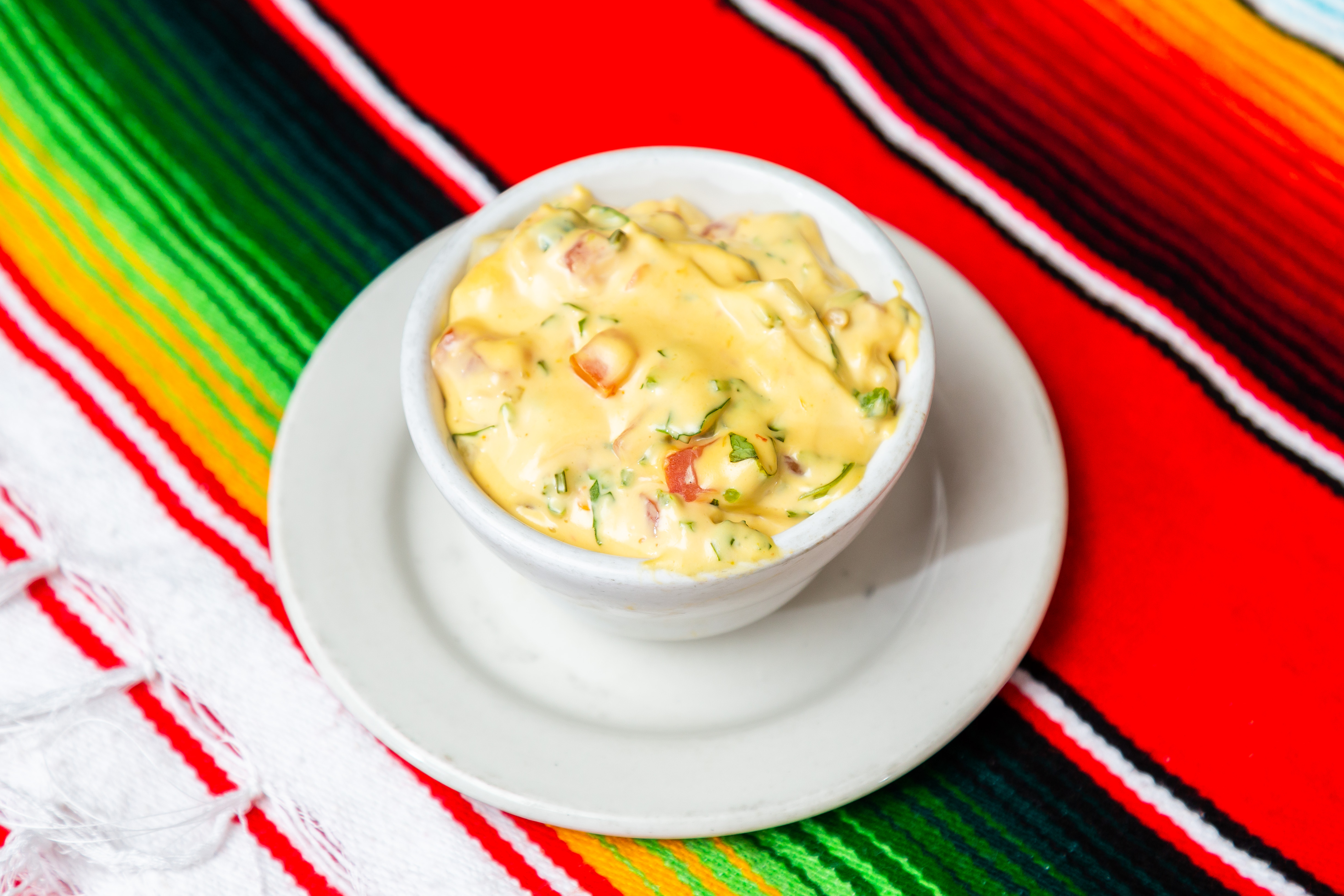 Order Queso Dip food online from Tamales store, Highland Park on bringmethat.com