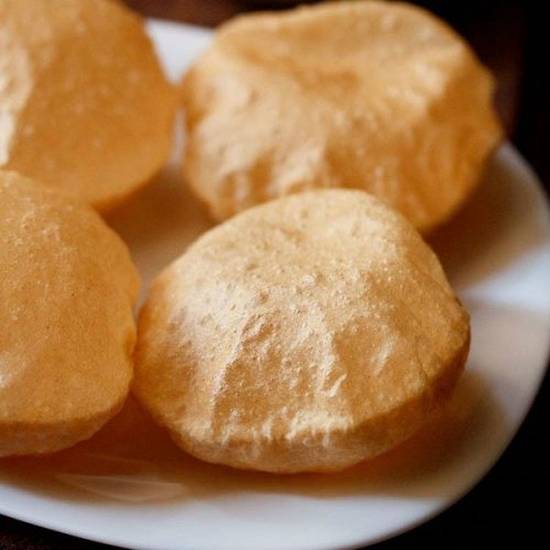 Order Poori (2 pcs) food online from Tower Indian Restaurant store, Morrisville on bringmethat.com