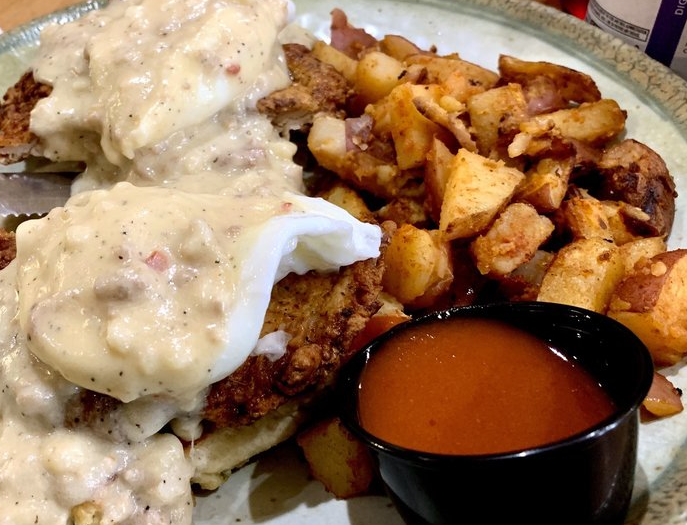 Order Country Chicken Benedict food online from Janik's Cafe store, Chicago on bringmethat.com