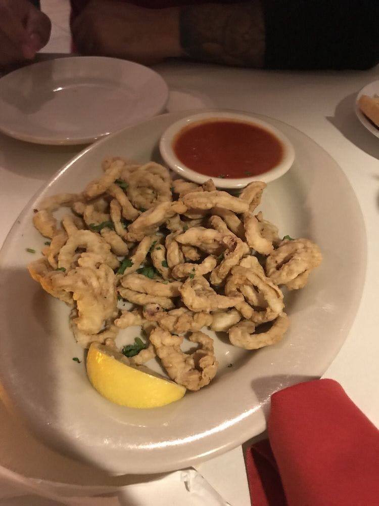 Order Calamari Fritti - Appetizer food online from Prima Pasta Restaurant store, Houston on bringmethat.com