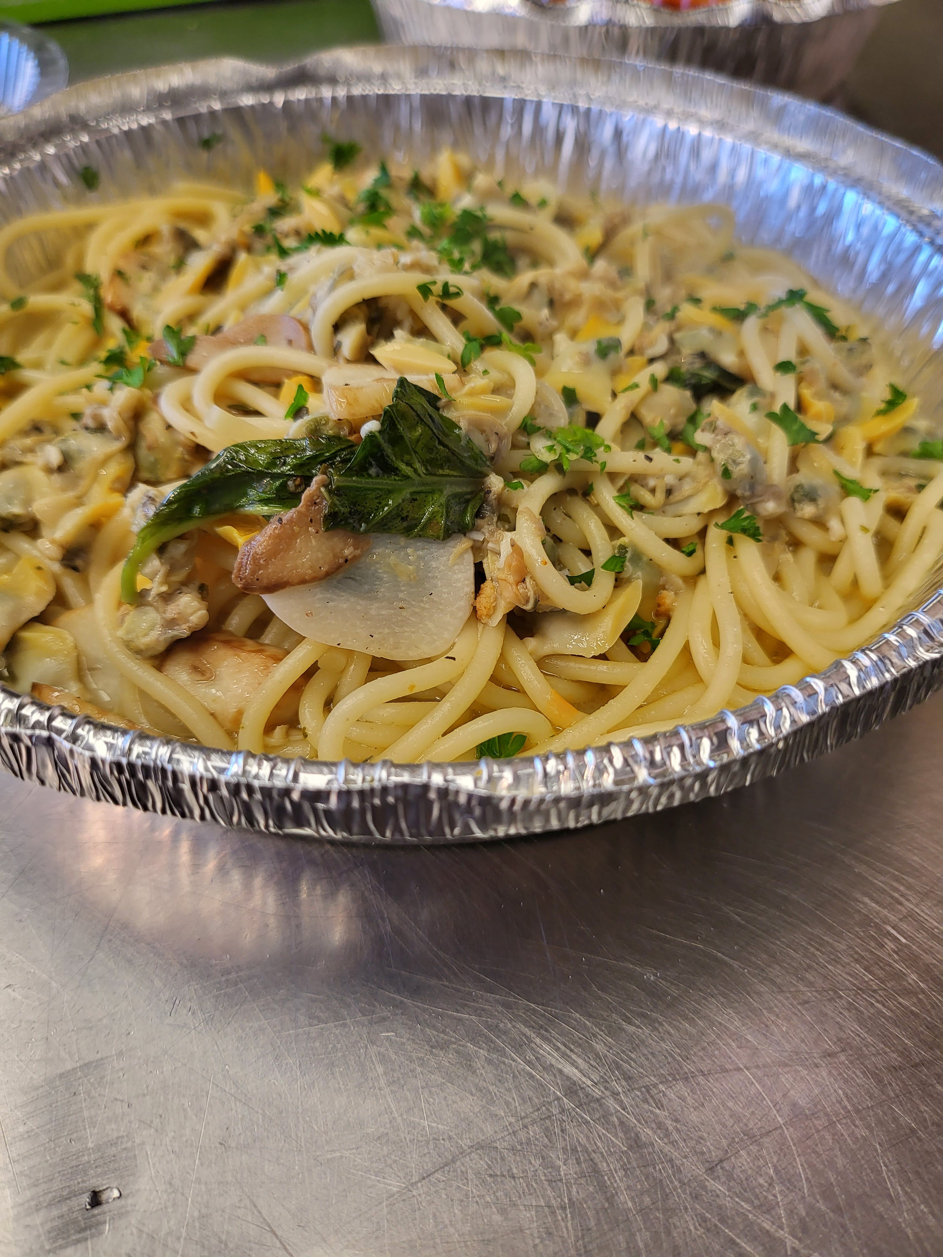 Order Spaghetti with White Clam Sauce - Pasta food online from Italian Touch Pizza & Pasta store, Staten Island on bringmethat.com