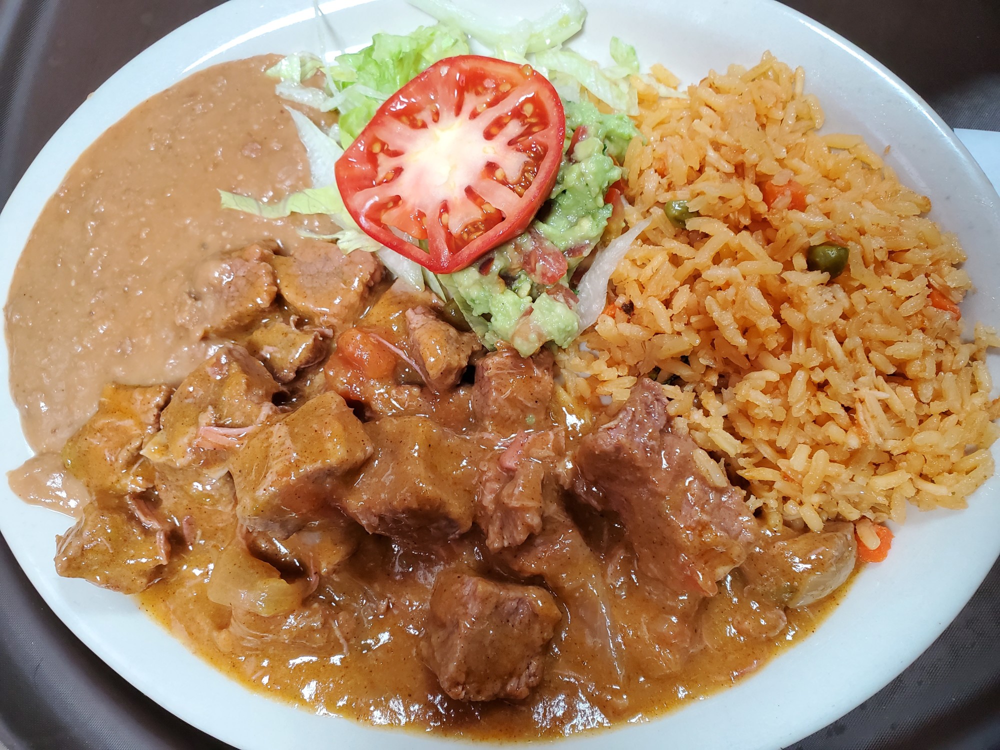 Order Carne Guisada Plate food online from Mariachis De Jalisco store, Georgetown on bringmethat.com