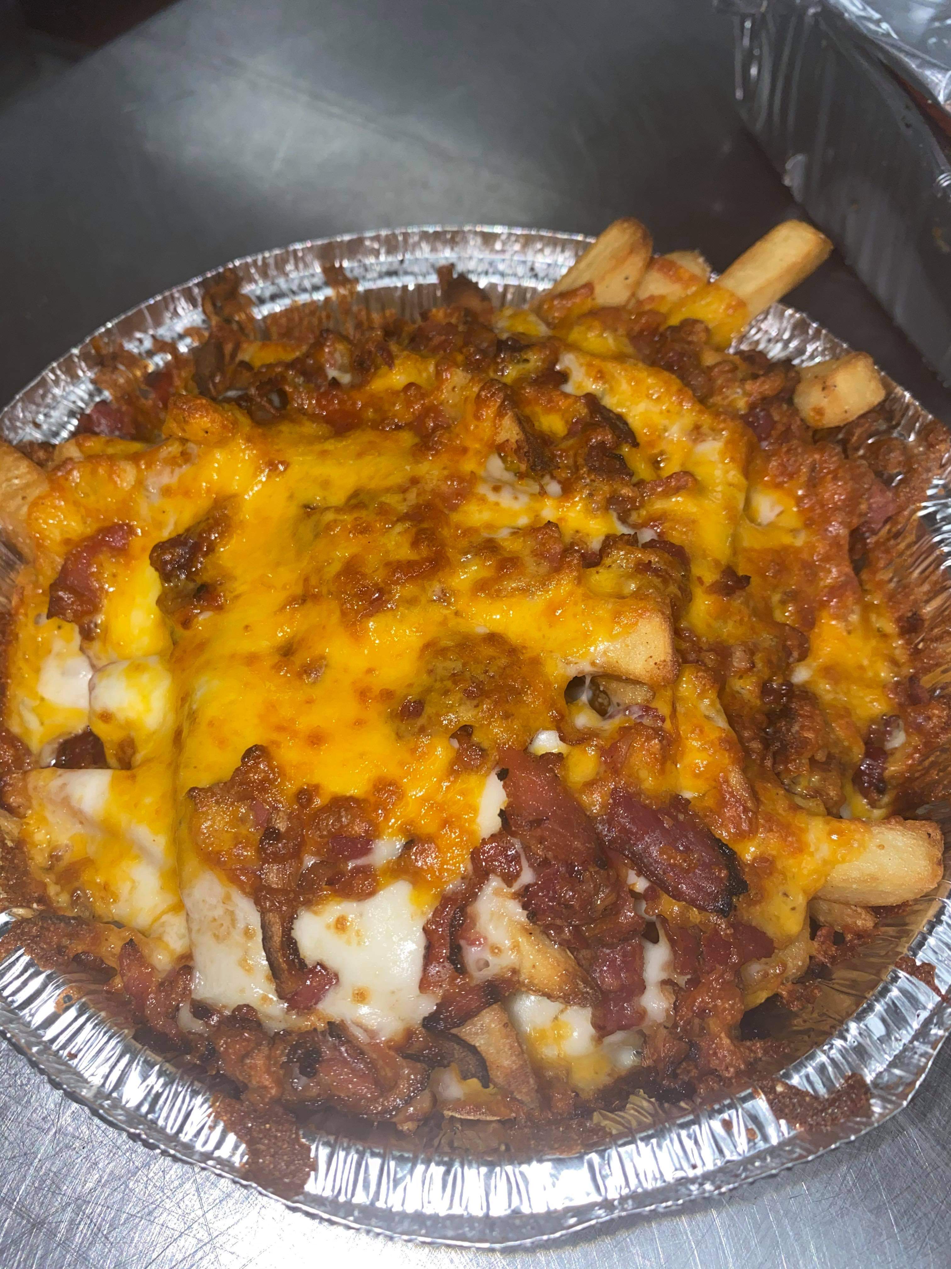 Order Monte Carlo Fries food online from Dan Pizza Co store, Webster on bringmethat.com