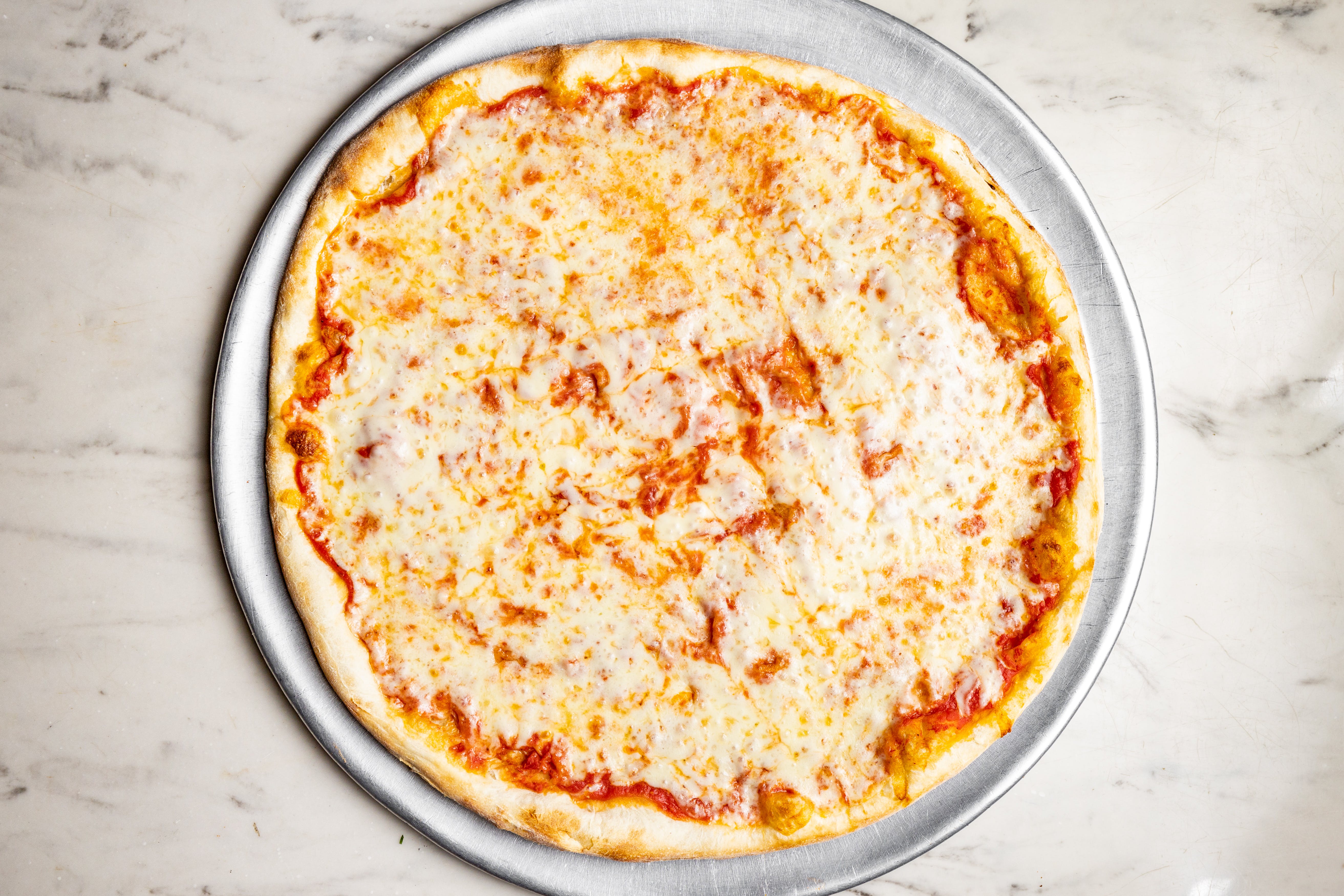 Order Cheese Pizza - Regular food online from Graziella Pizza store, Flushing on bringmethat.com