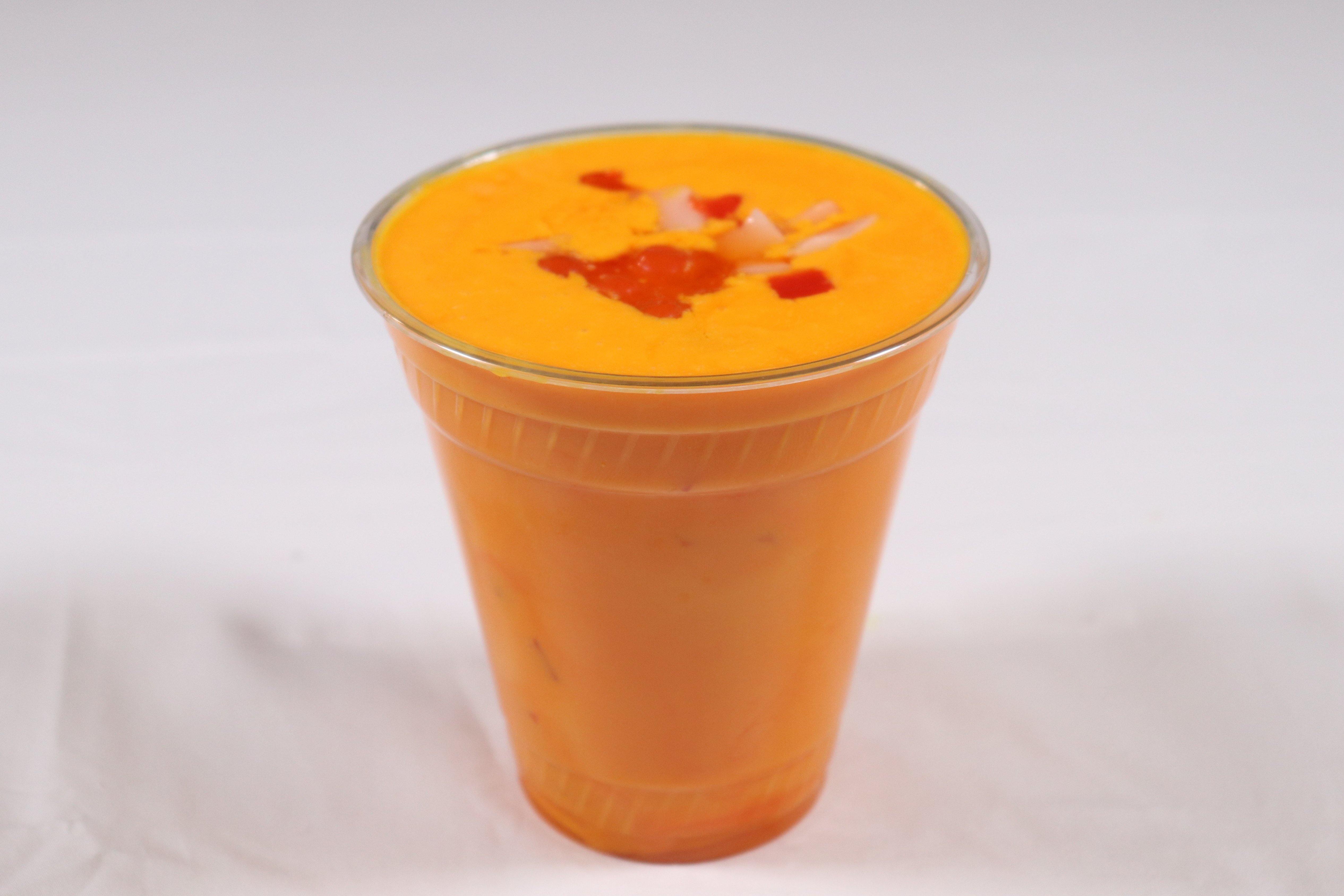 Order Mango Lassi food online from Hot N Spicy Restaurant store, Irving on bringmethat.com