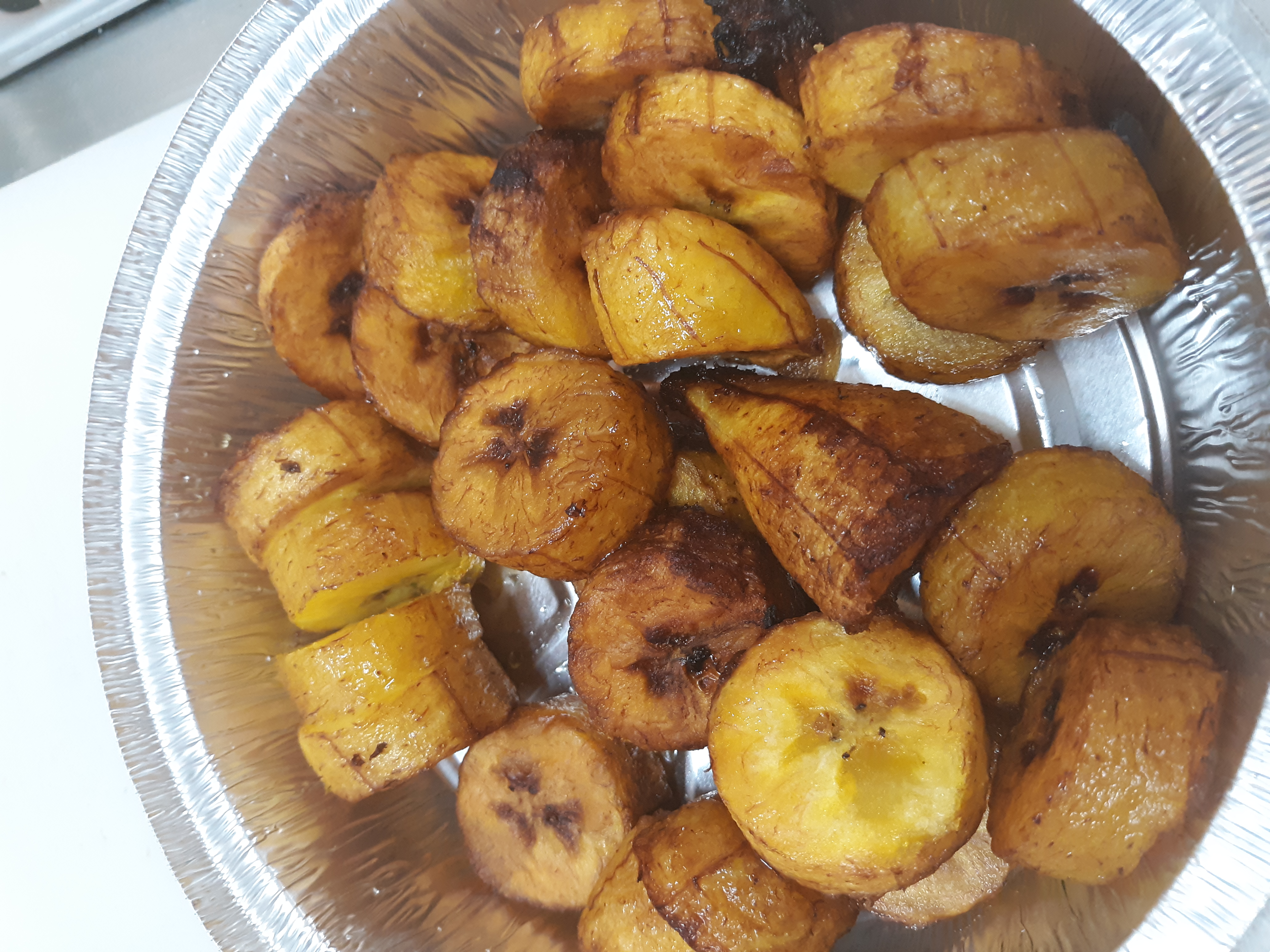 Order Maduros (Fried Sweet Plantains) food online from Oscar's Kitchen store, Bronx on bringmethat.com
