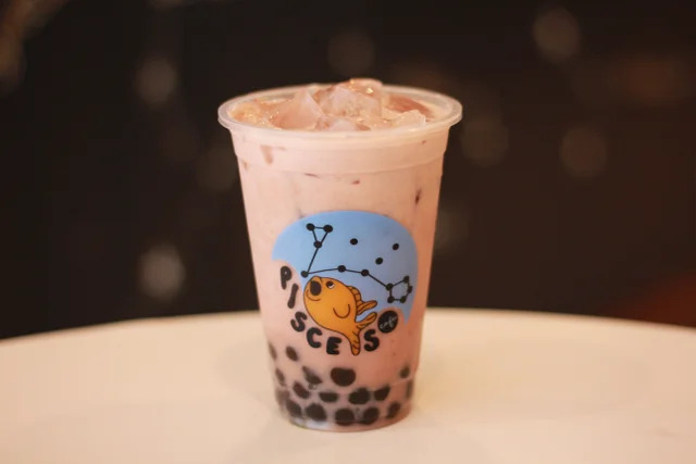 Order Iced Red Bean Milk Tea food online from Pisces Cafe Boba & Tea store, Lisle on bringmethat.com