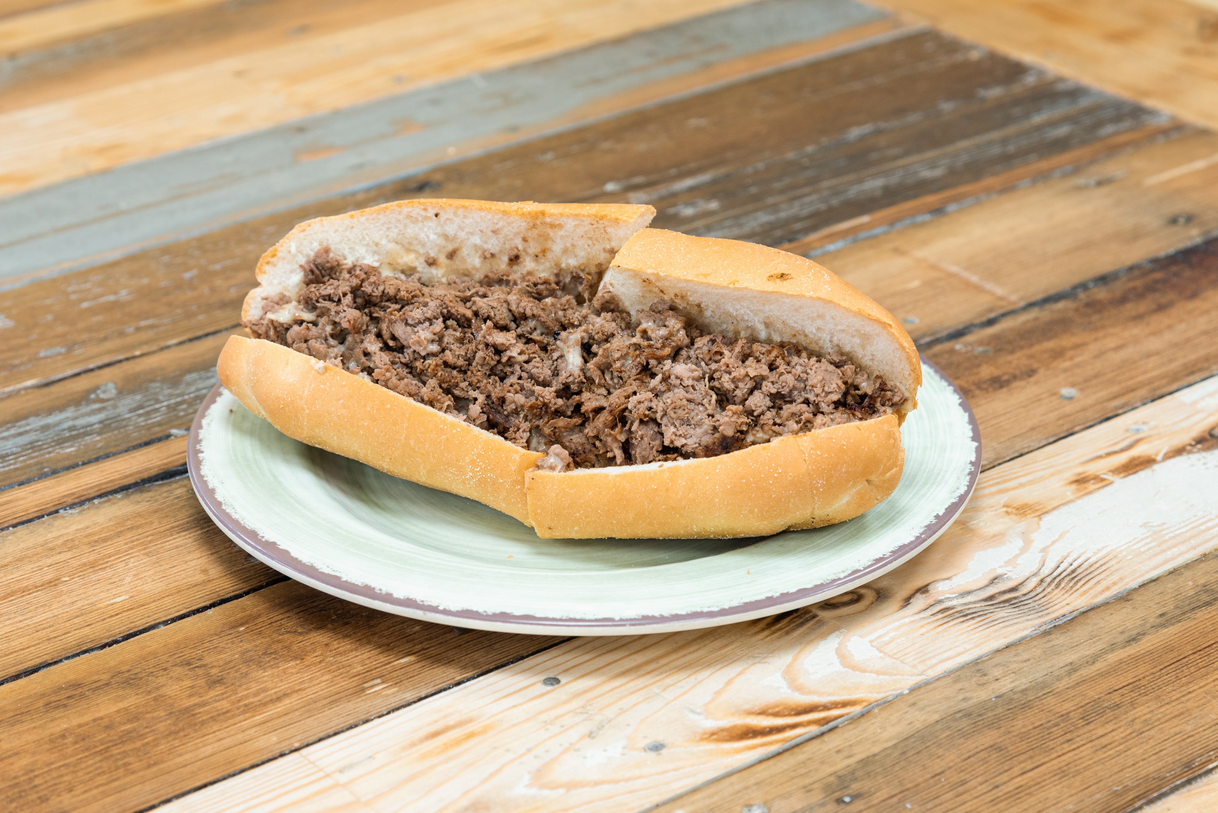 Order Steak & Cheese Sub - Small food online from Milano's Delicatessen store, East Boston on bringmethat.com