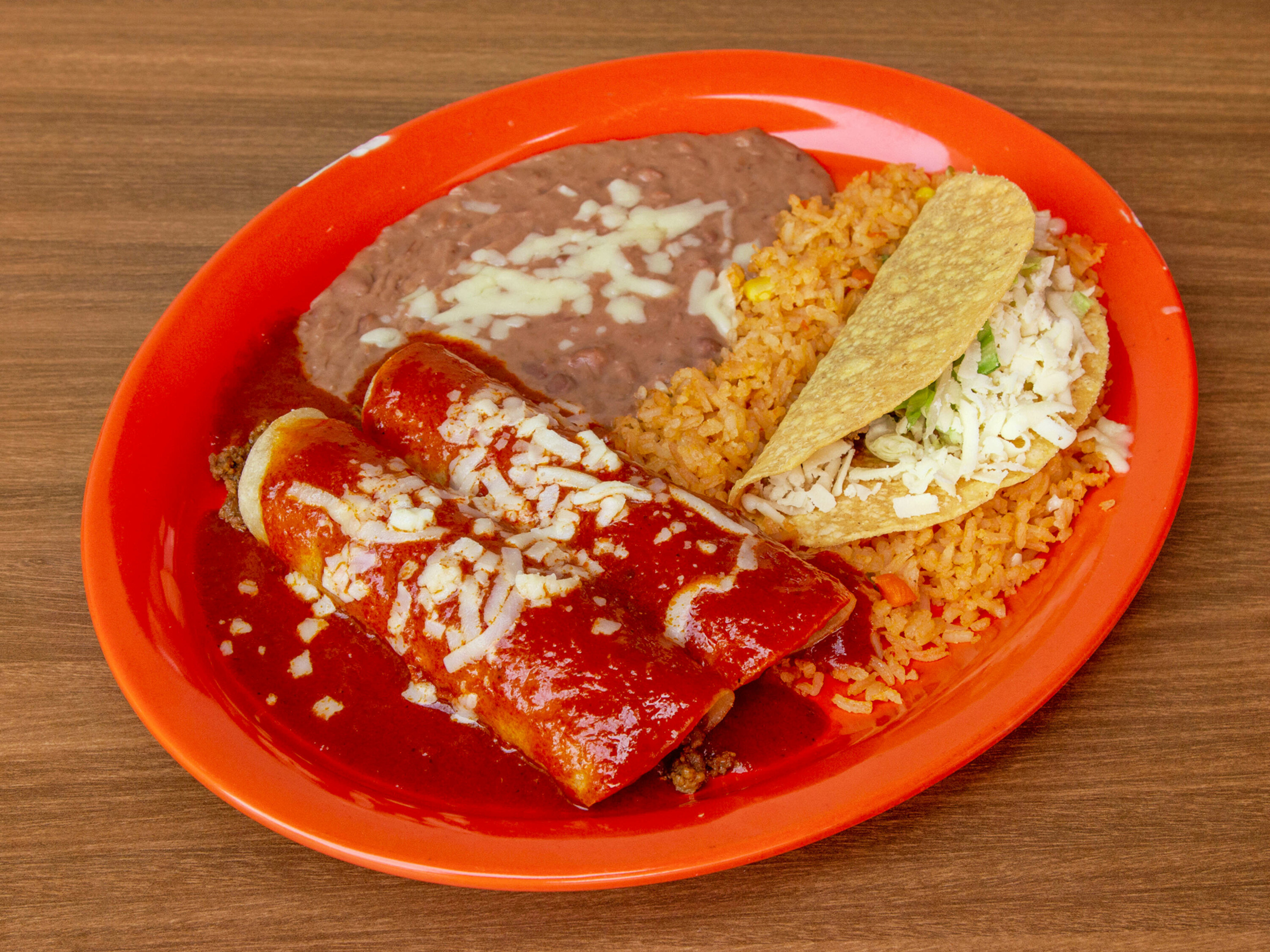 Order 23. 2 Enchiladas, Taco, Mexican Rice and Refried Beans Combination food online from Amigo's Tequila Mexican Grill - Harvest Mill Way store, Knoxville on bringmethat.com