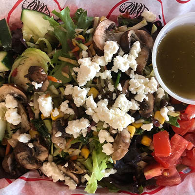 Order *Baby Bella Salad. food online from Groucho's Deli store, Spartanburg on bringmethat.com