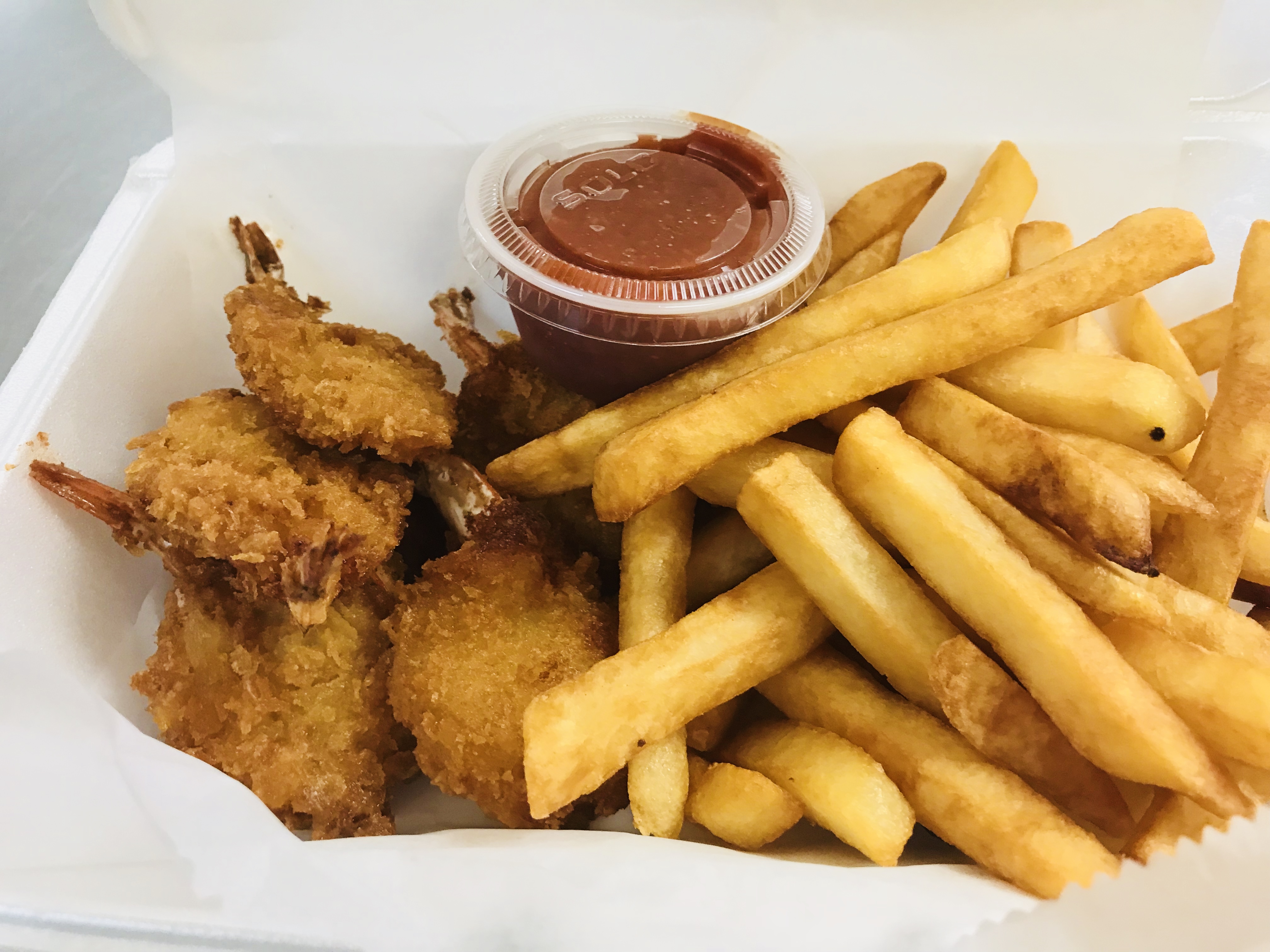 Order 6 Piece Jumbo Butterfly Shrimp with one side food online from A-1 Deli And Fried Chicken store, Wilmington on bringmethat.com